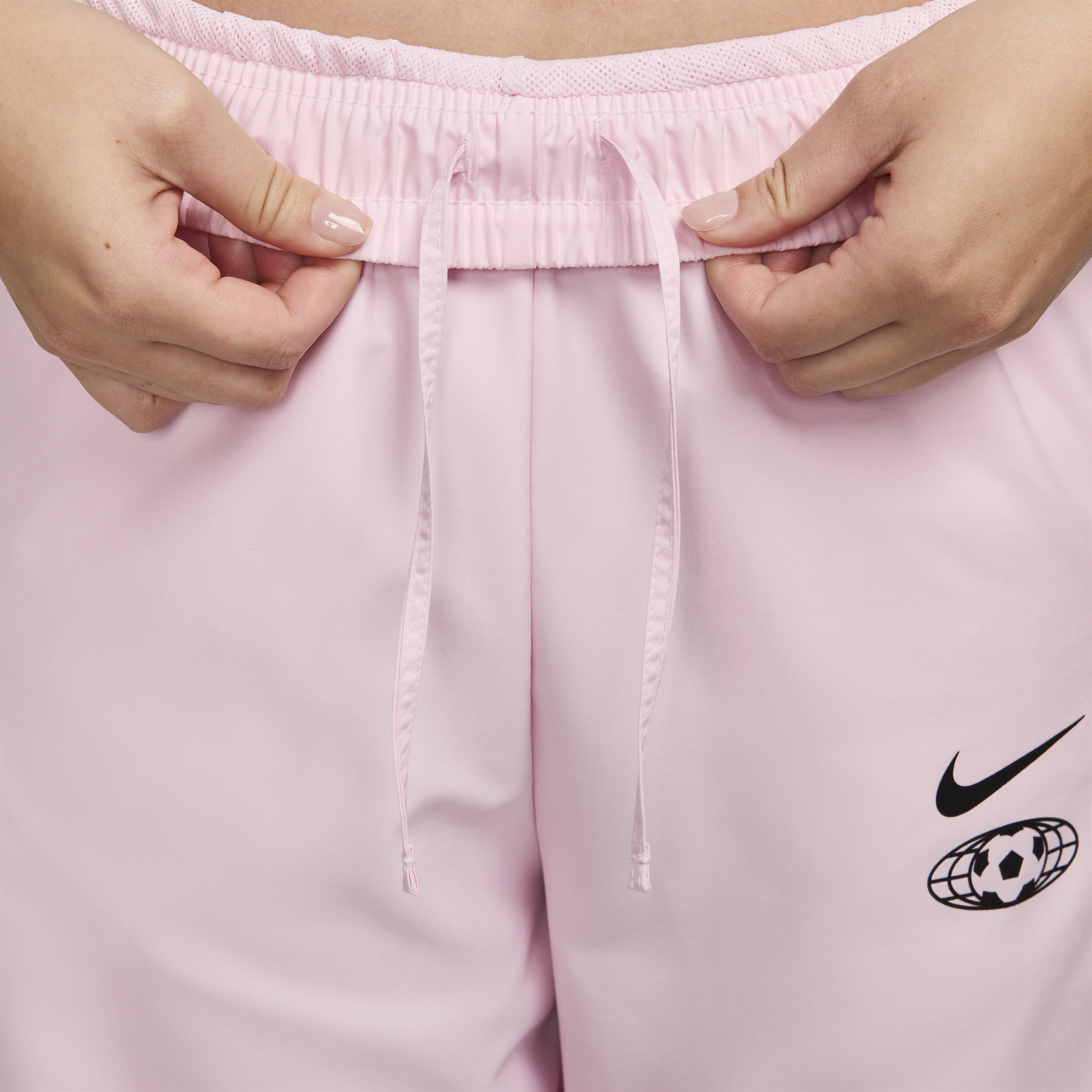 Nike Sportswear geweven joggingbroek voor dames Roze