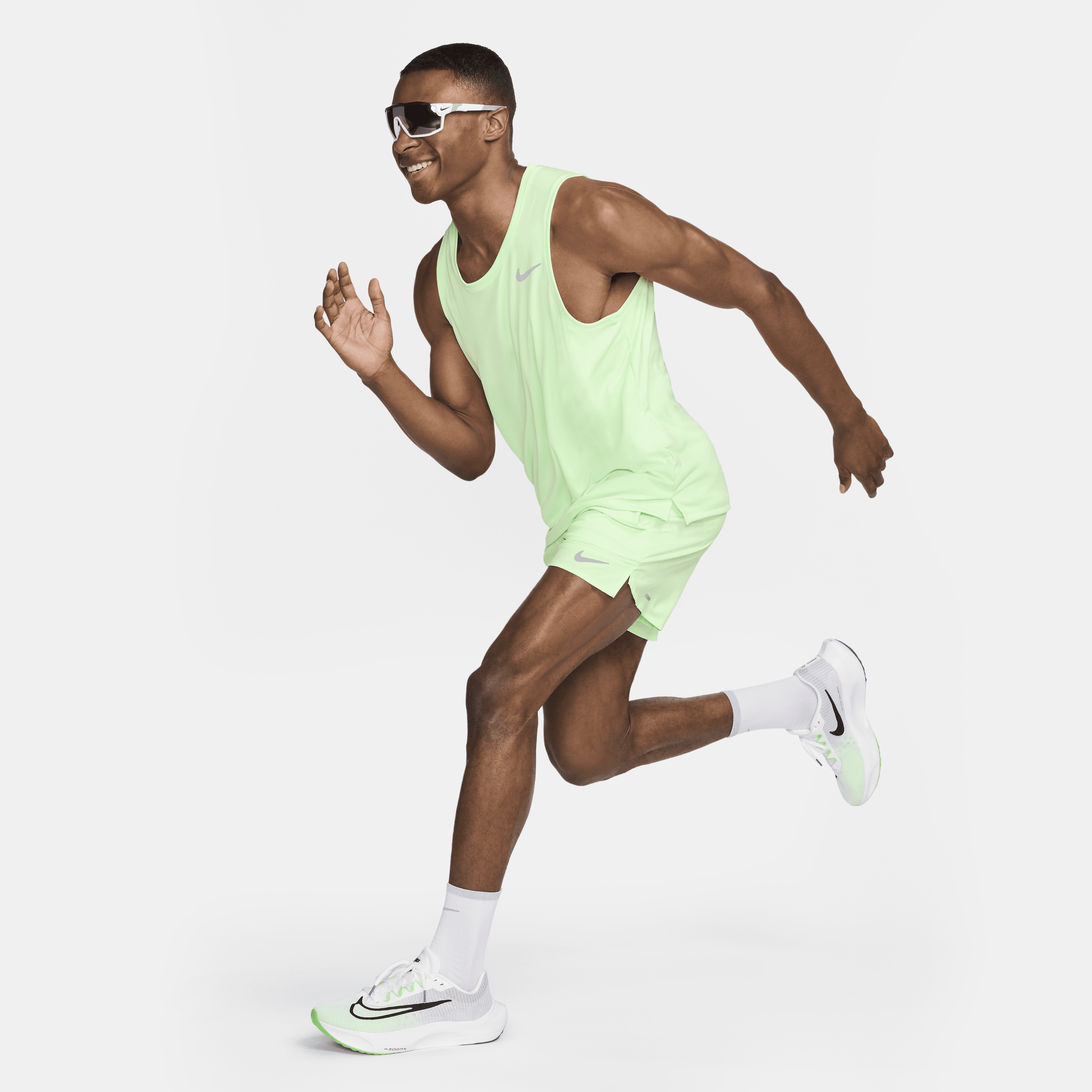 Nike Miler hardlooptanktop met Dri-FIT voor heren Groen