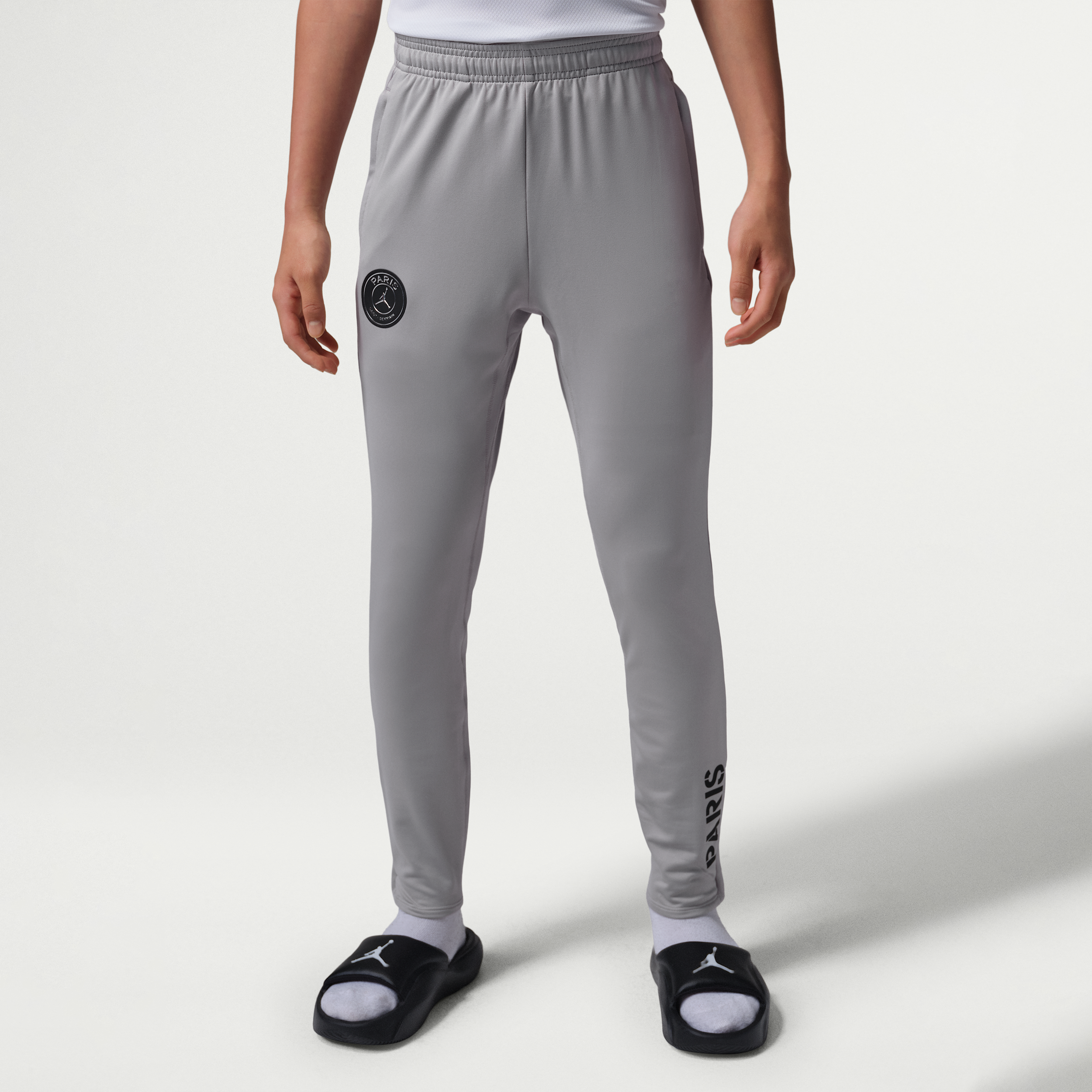 Pantaloni da calcio in maglia Jordan Dri-FIT Paris Saint-Germain Strike Night Edition – Ragazzo/a - Grigio