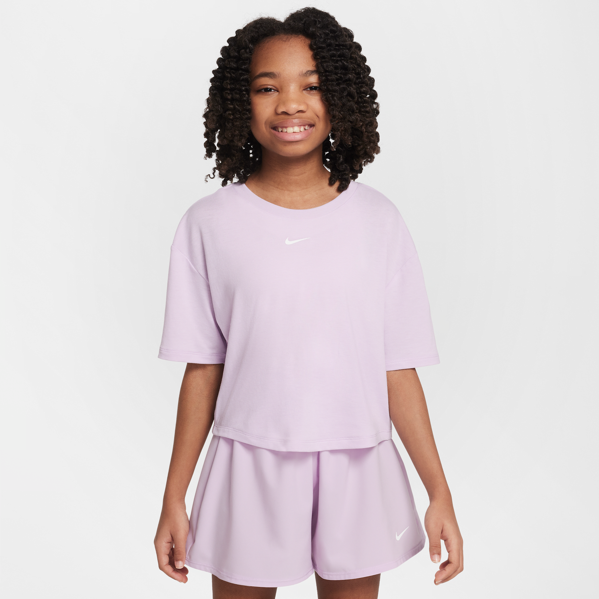 Nike One Relaxed Older Kids' (Girls') Dri-FIT Short-Sleeve Top - Purple - Sustainable Blends - 50% Sustainable Blends