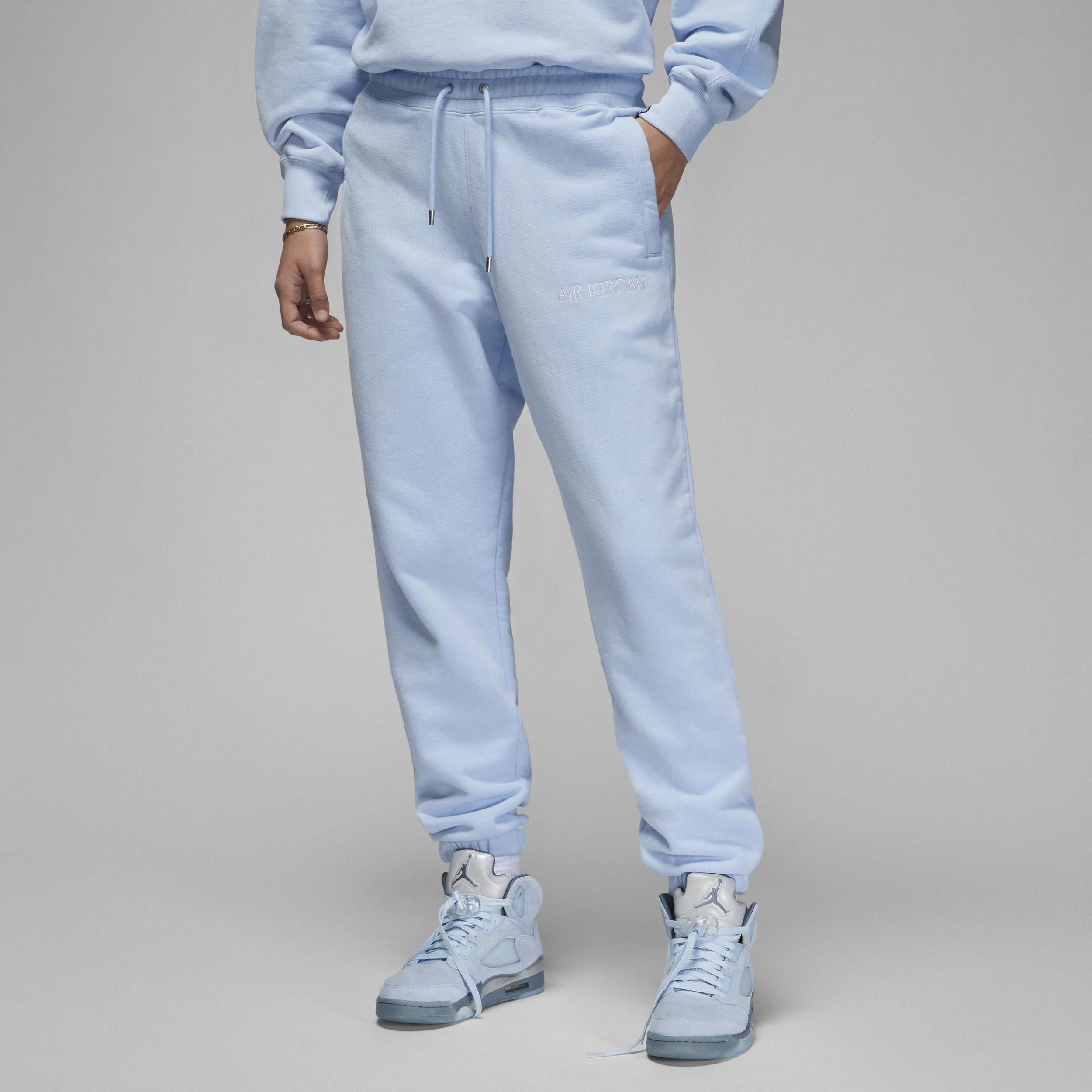 Damskie spodnie z dzianiny Air Jordan Wordmark - Niebieski