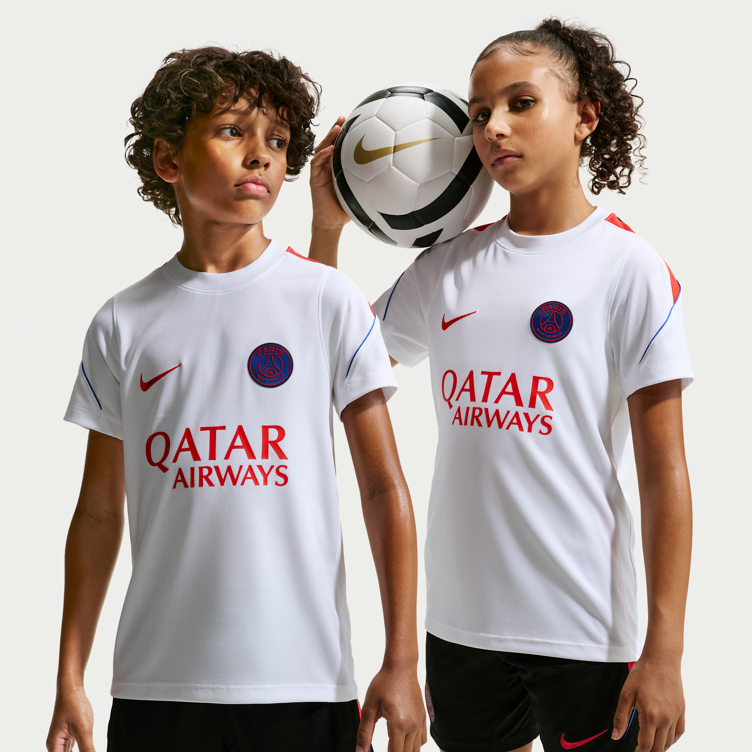 Kortærmet Paris Saint-Germain Strike Nike Dri-FIT-fodboldtrøje til større børn - hvid
