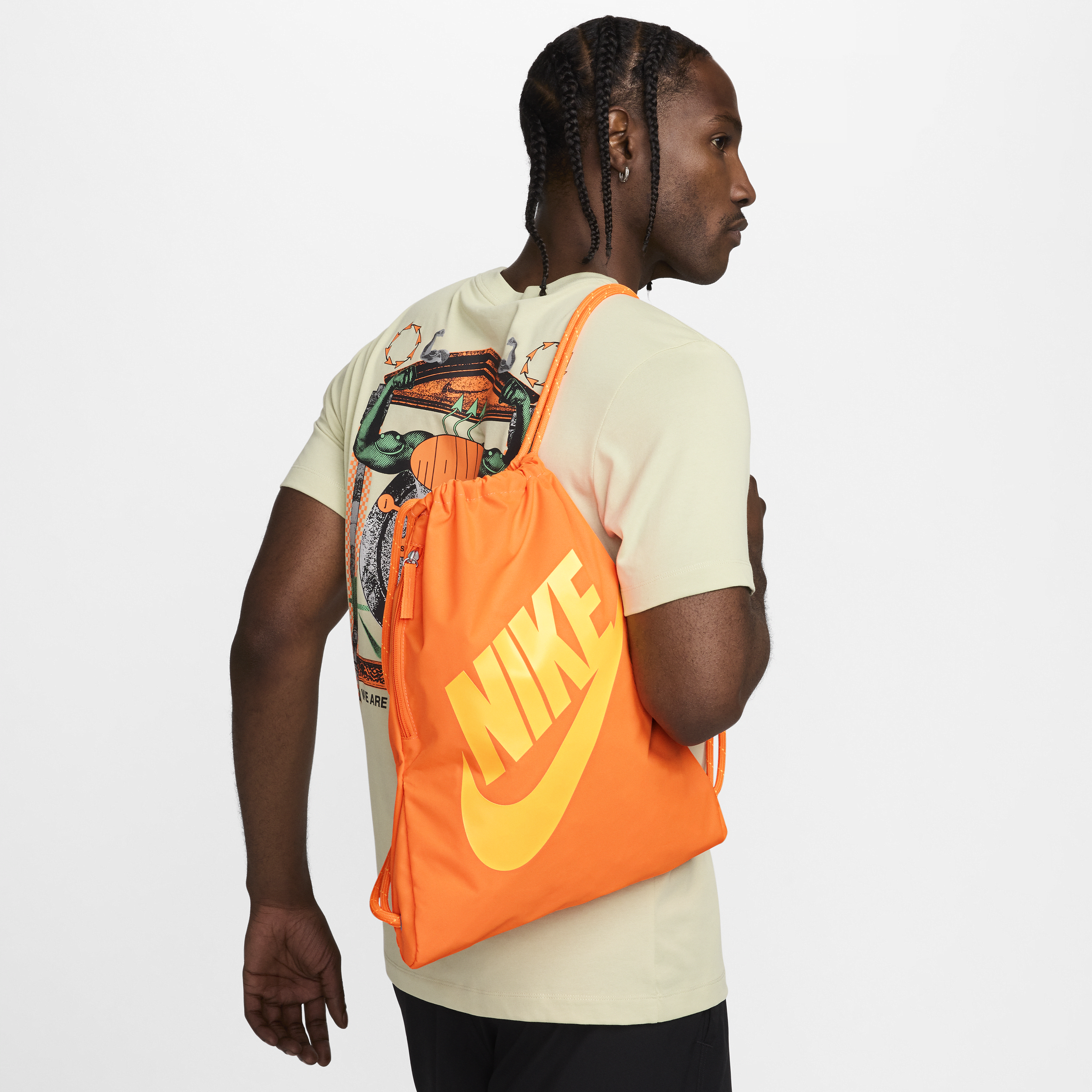 Image of Nike Heritage Tas met trekkoord (13 liter) - Oranje