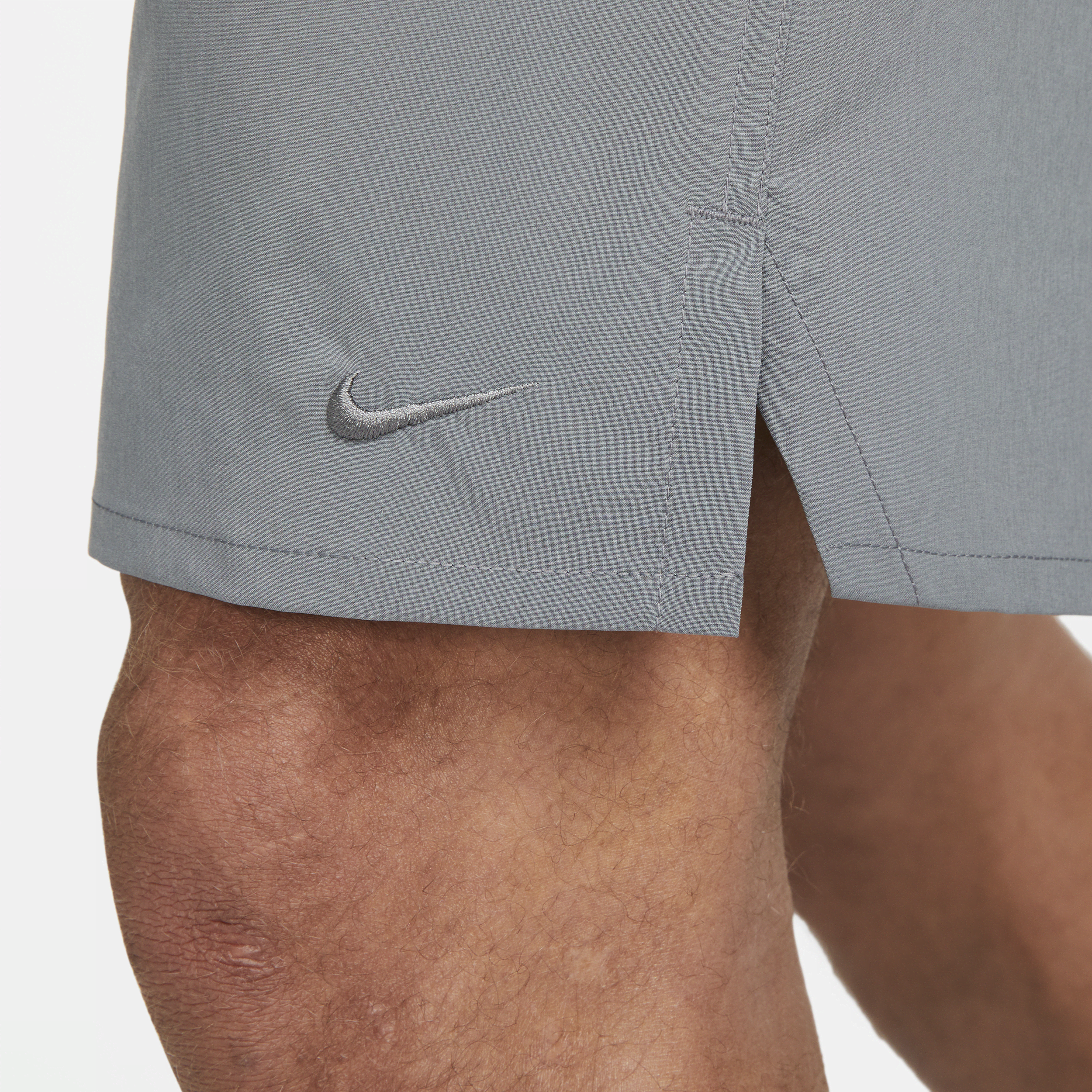 Nike Unlimited multifunctionele niet-gevoerde herenshorts met Dri-FIT (23 cm) Grijs