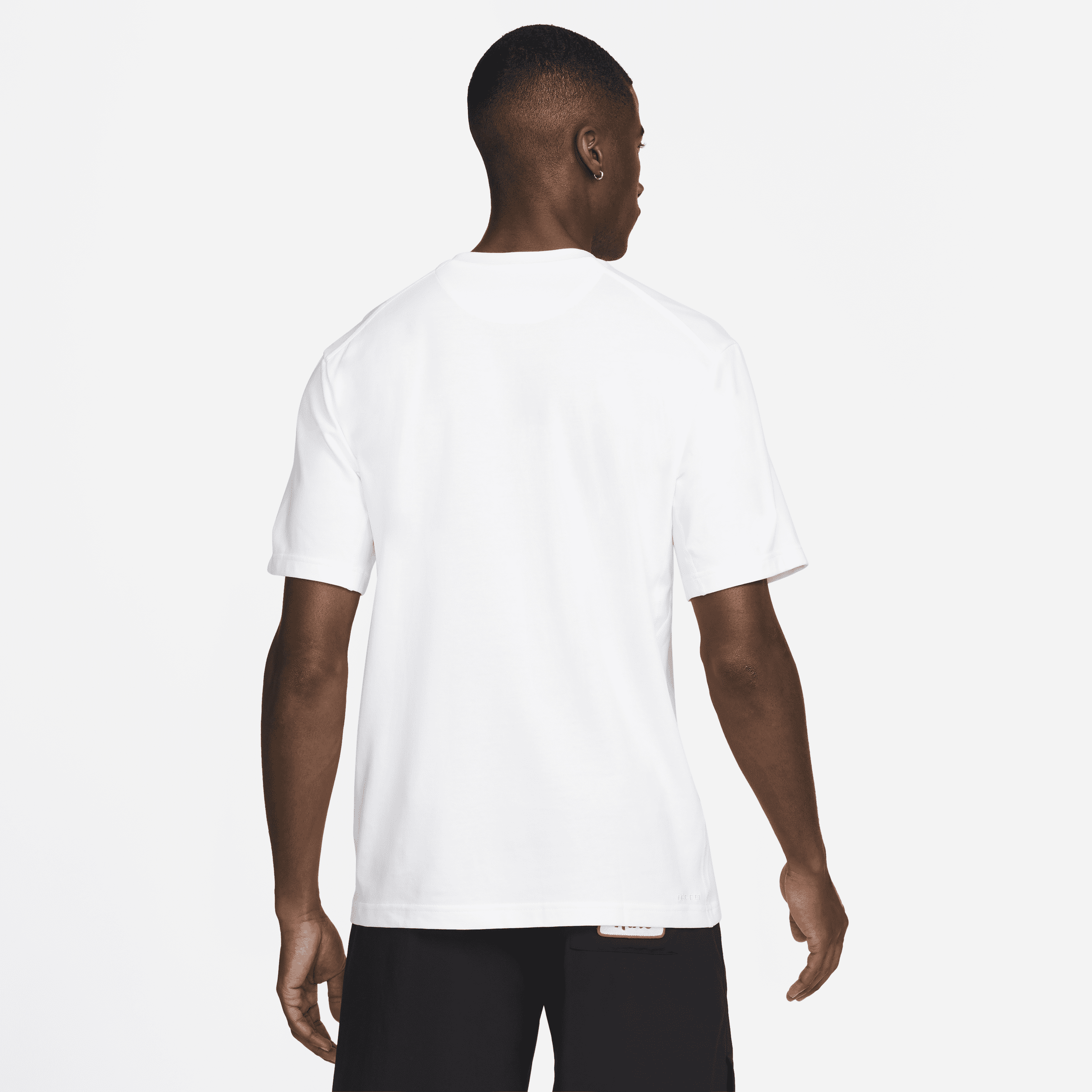 Haut à manches courtes Dri-FIT Nike Primary pour homme - Blanc