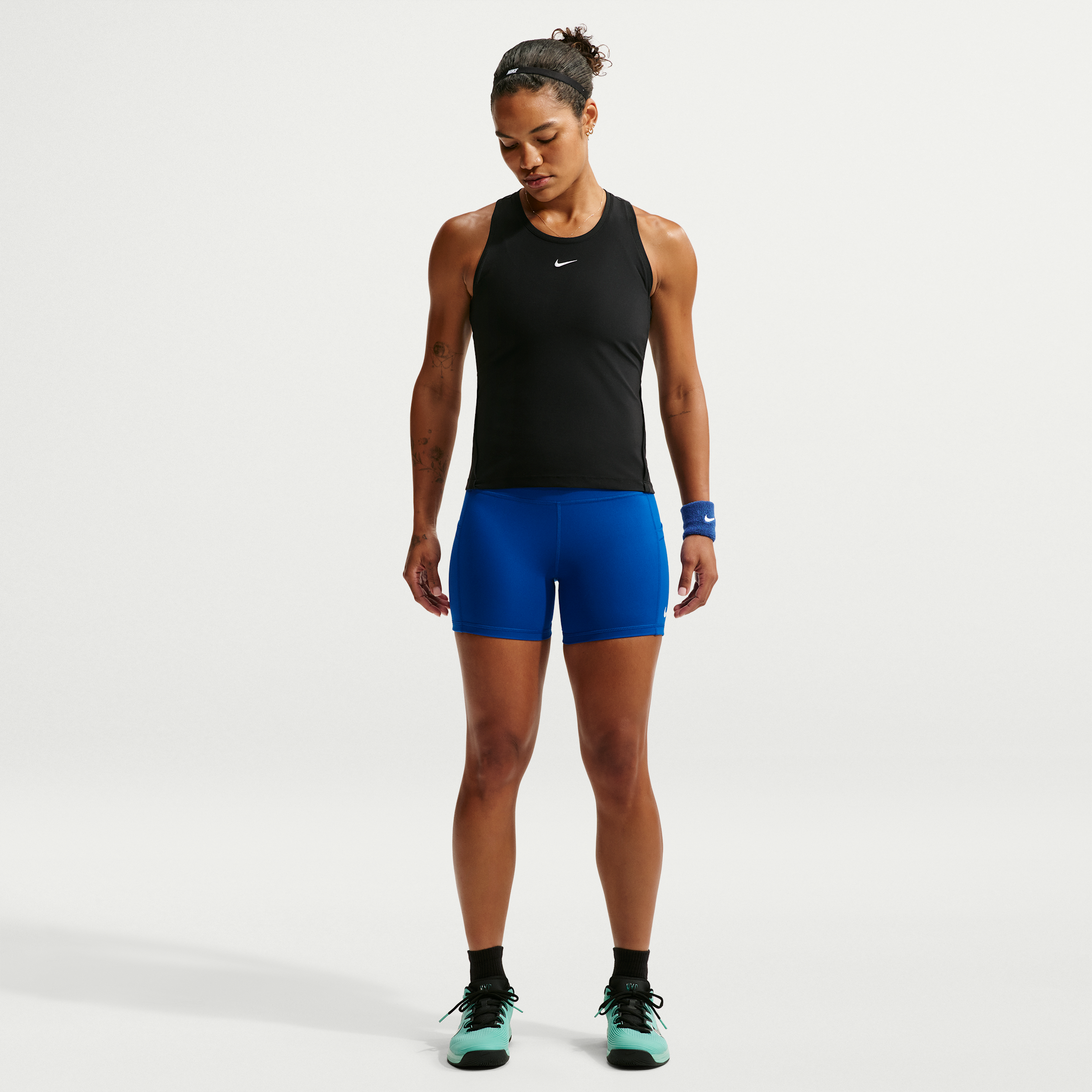NikeCourt-Dri-FIT-tennisshorts med lommer til kvinder - blå