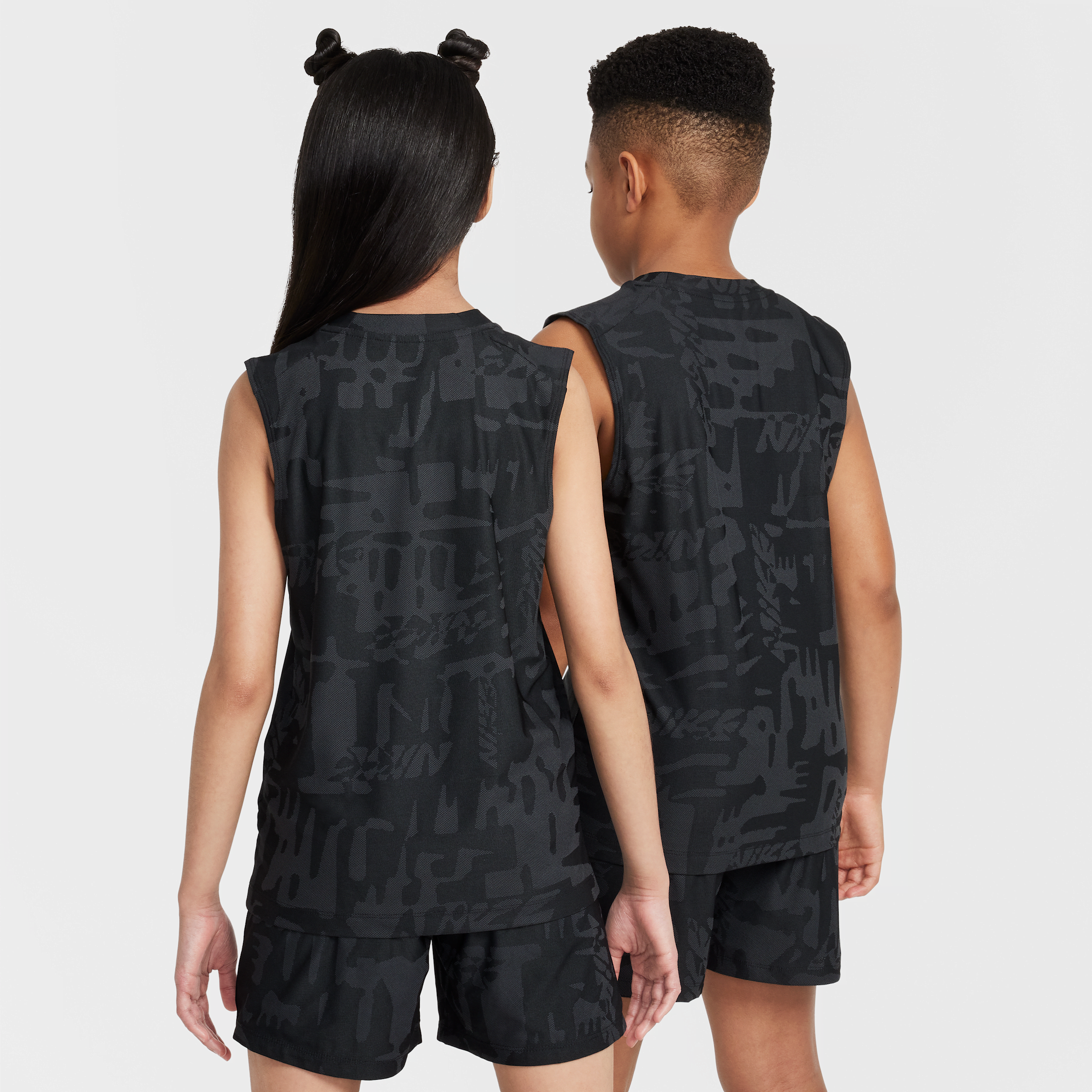 Thumbnail - Nike Multi ärmelloses Dri-FIT-Shirt (ältere Kinder) - Schwarz