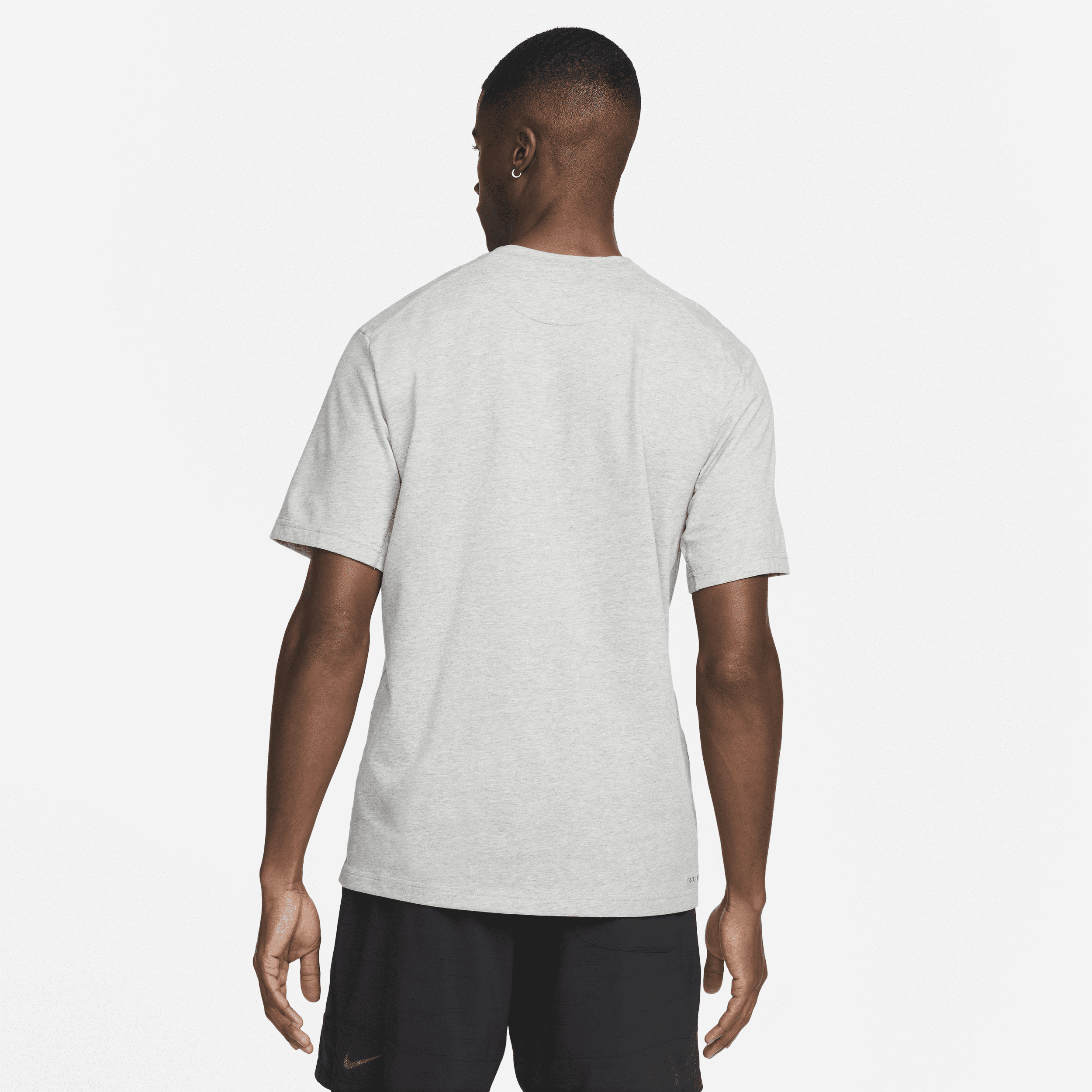 Haut à manches courtes Dri-FIT Nike Primary pour homme - Gris