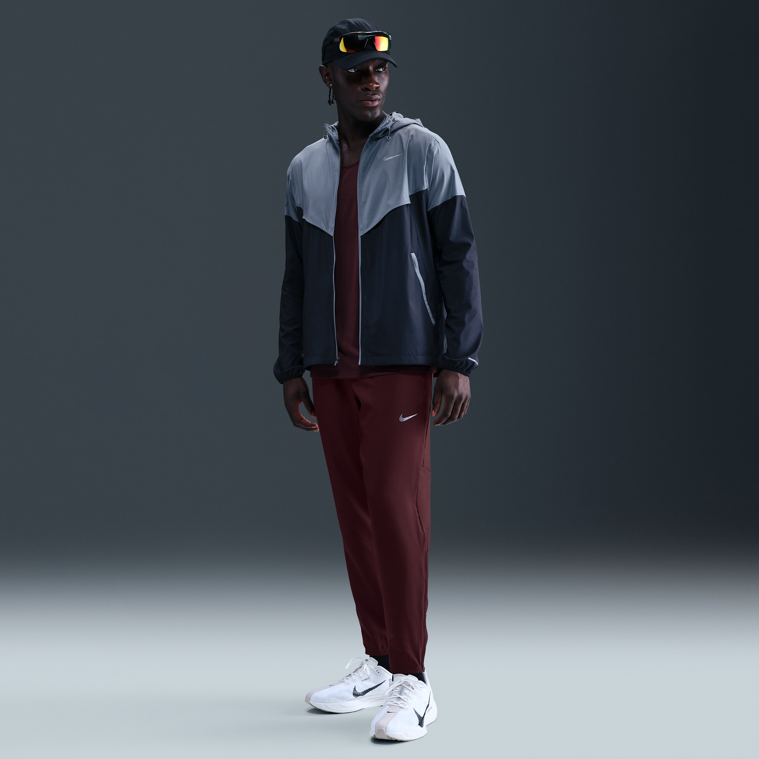 Nike Challenger Dri-FIT geweven hardloopbroek voor heren - Rood