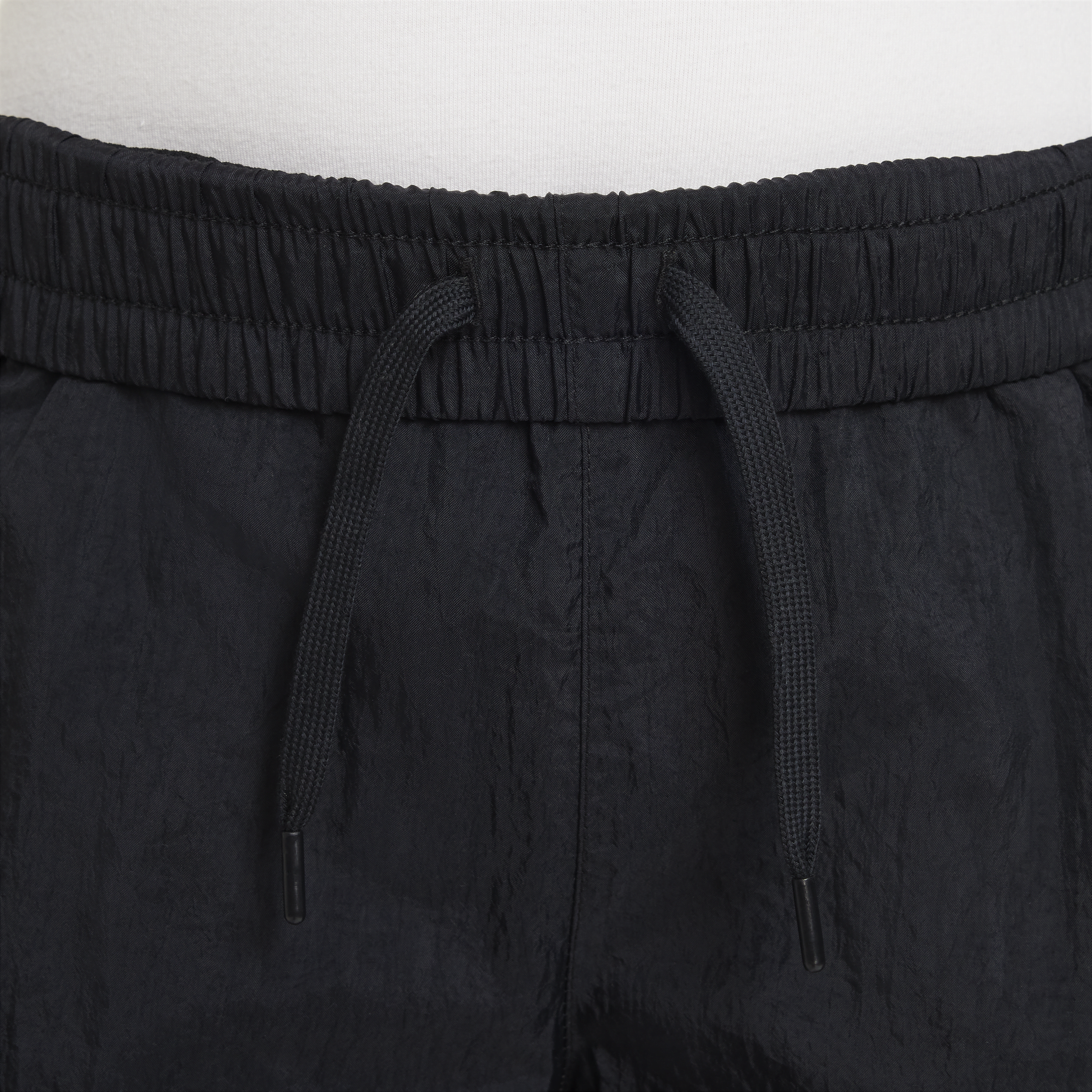 Nike Sportswear Geweven cargobroek met hoge taille voor meisjes Zwart