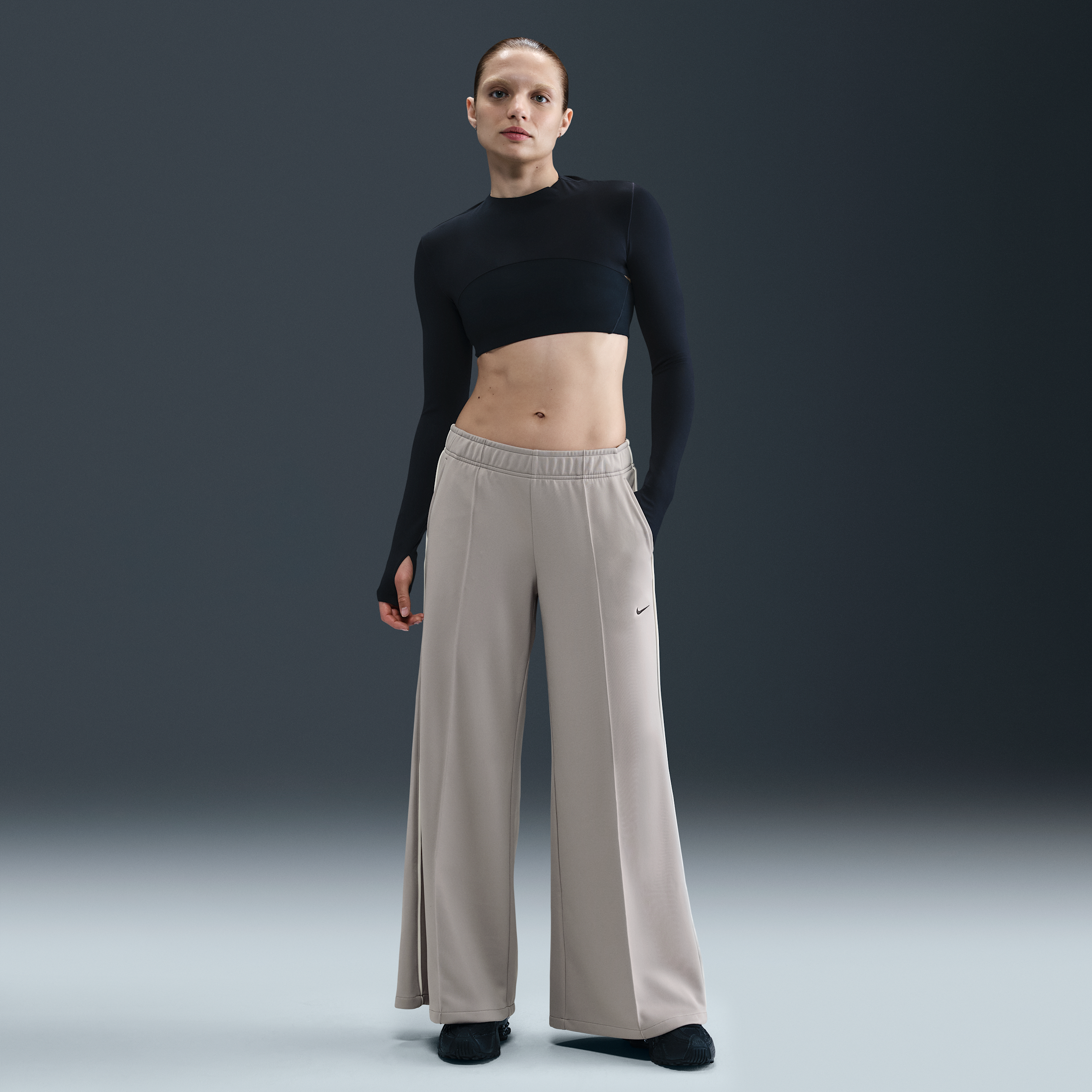 Nike trainingsbroek met wijde pijpen en halfhoge taille voor dames - Grijs