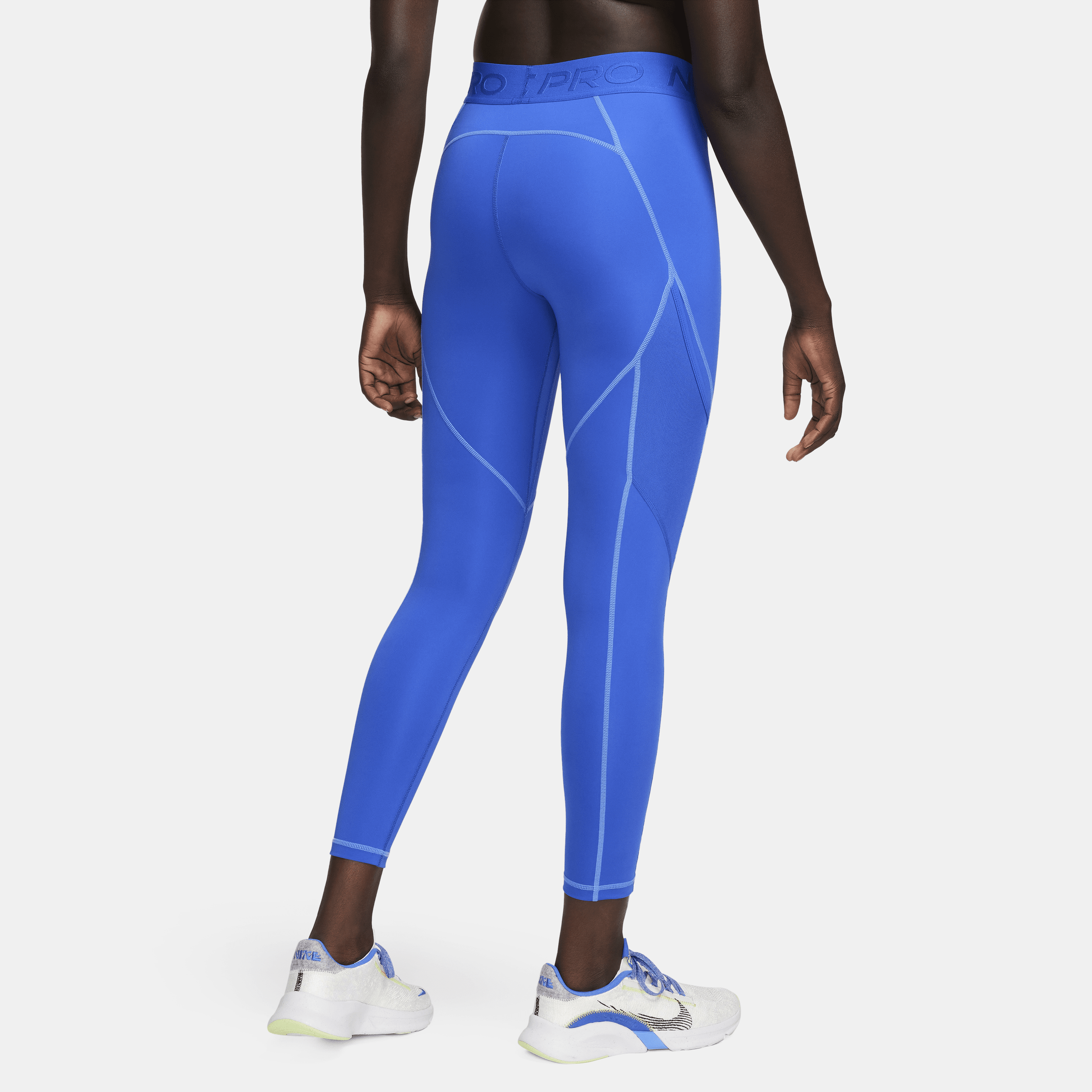 Nike Pro 7 8-legging met halfhoge taille en zakken voor dames Blauw