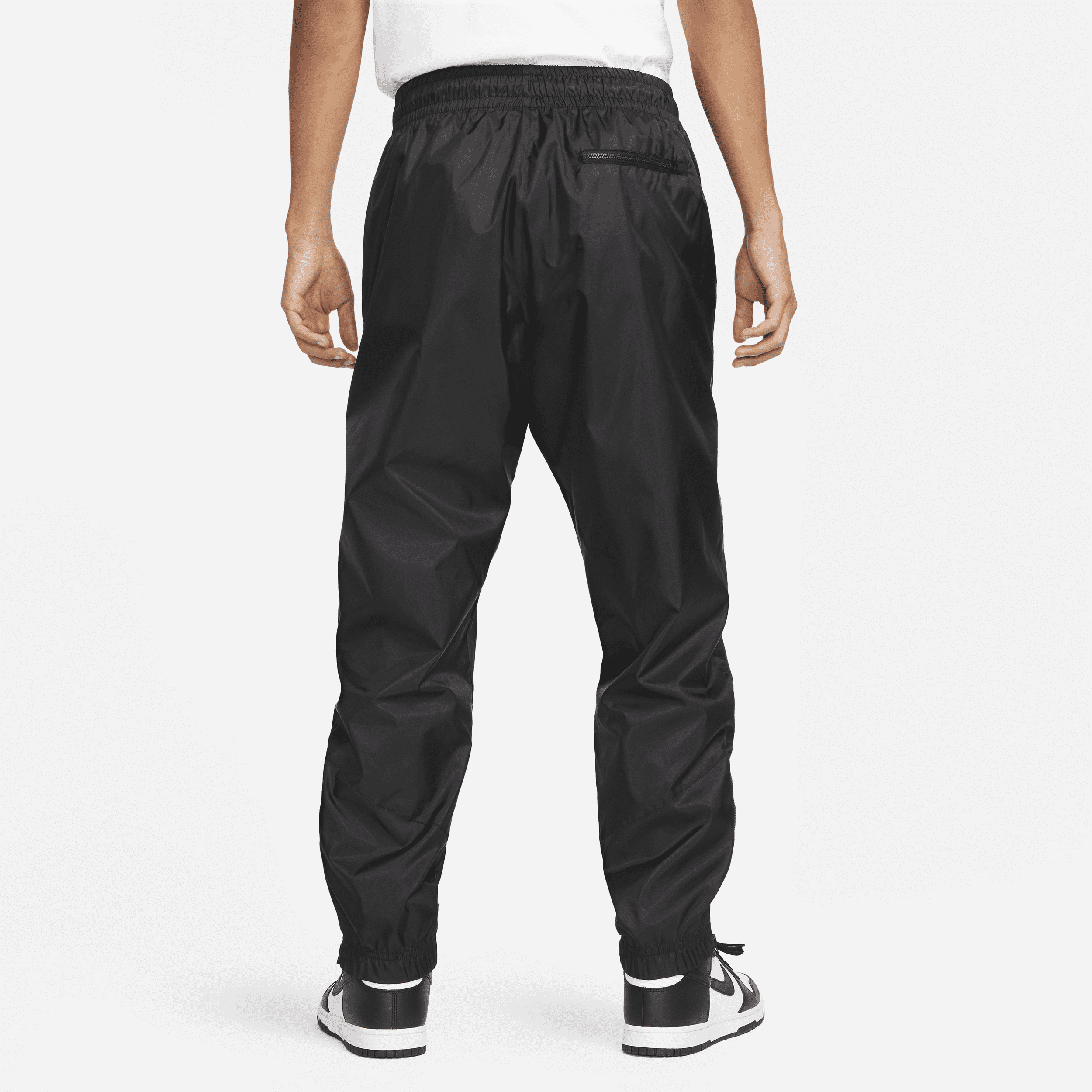 Pantalon doublé en tissu tissé Nike Windrunner pour homme - Noir