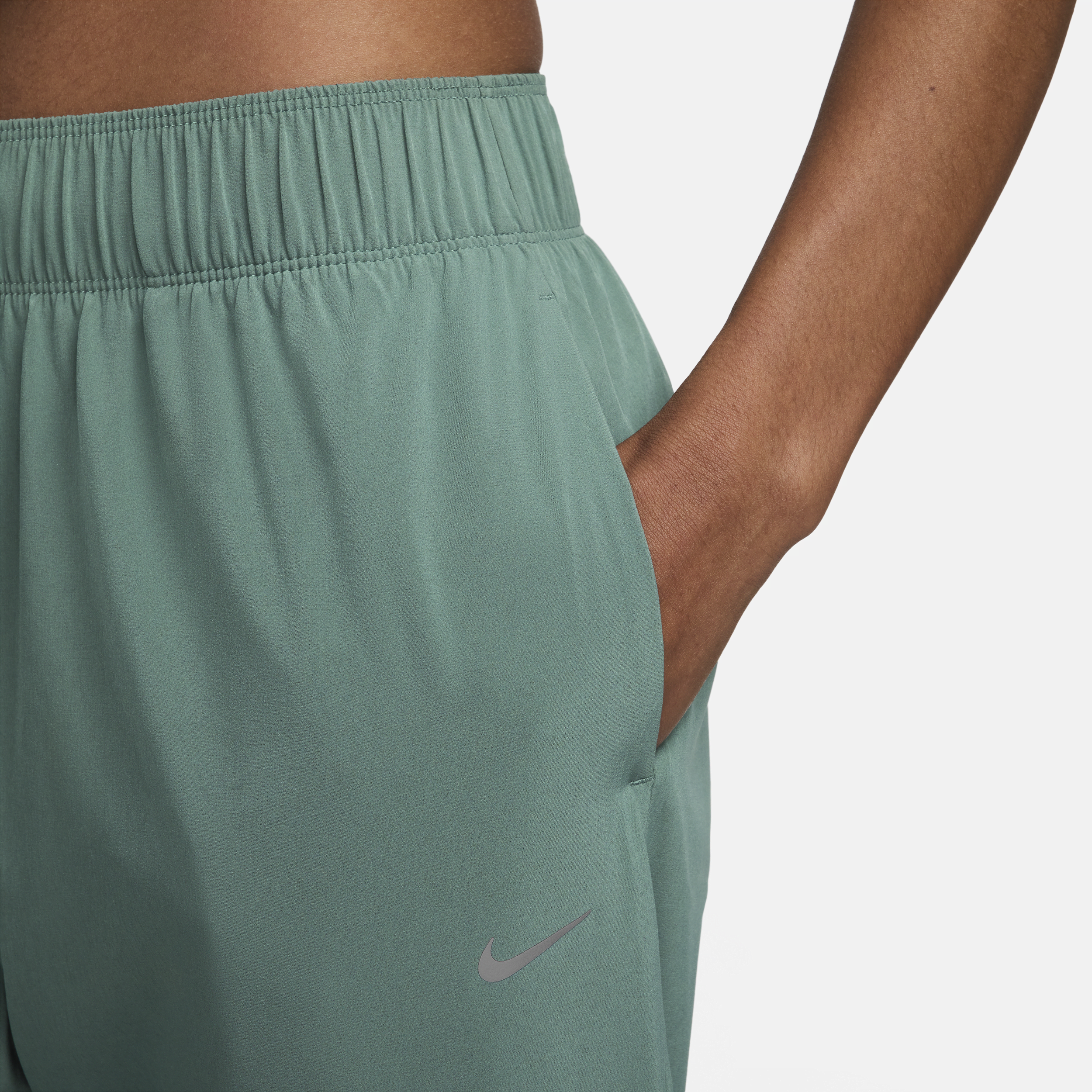 Nike Dri-FIT Fast 7 8-hardloopbroek met halfhoge taille voor dames Groen