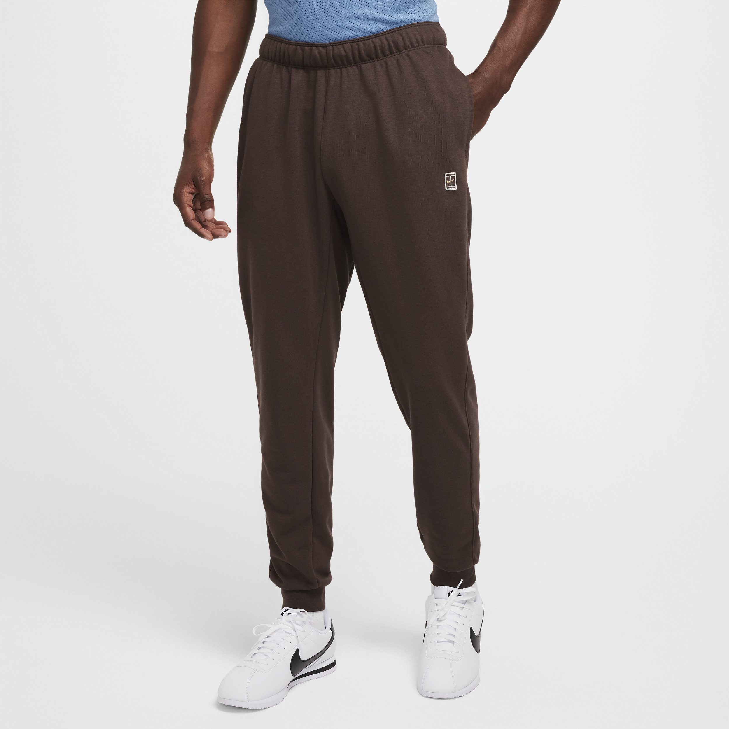 Pantalon de tennis en molleton NikeCourt Heritage pour homme - Marron