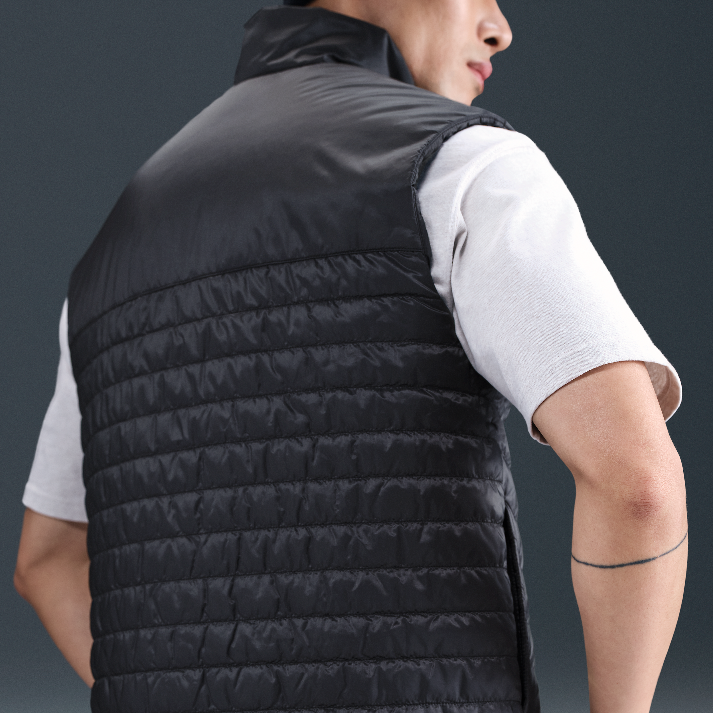 Thumbnail - Tottenham Hotspur Windrunner Nike Therma-FIT mittelschwere Fußball-Puffer-Weste (Herren) - Schwarz