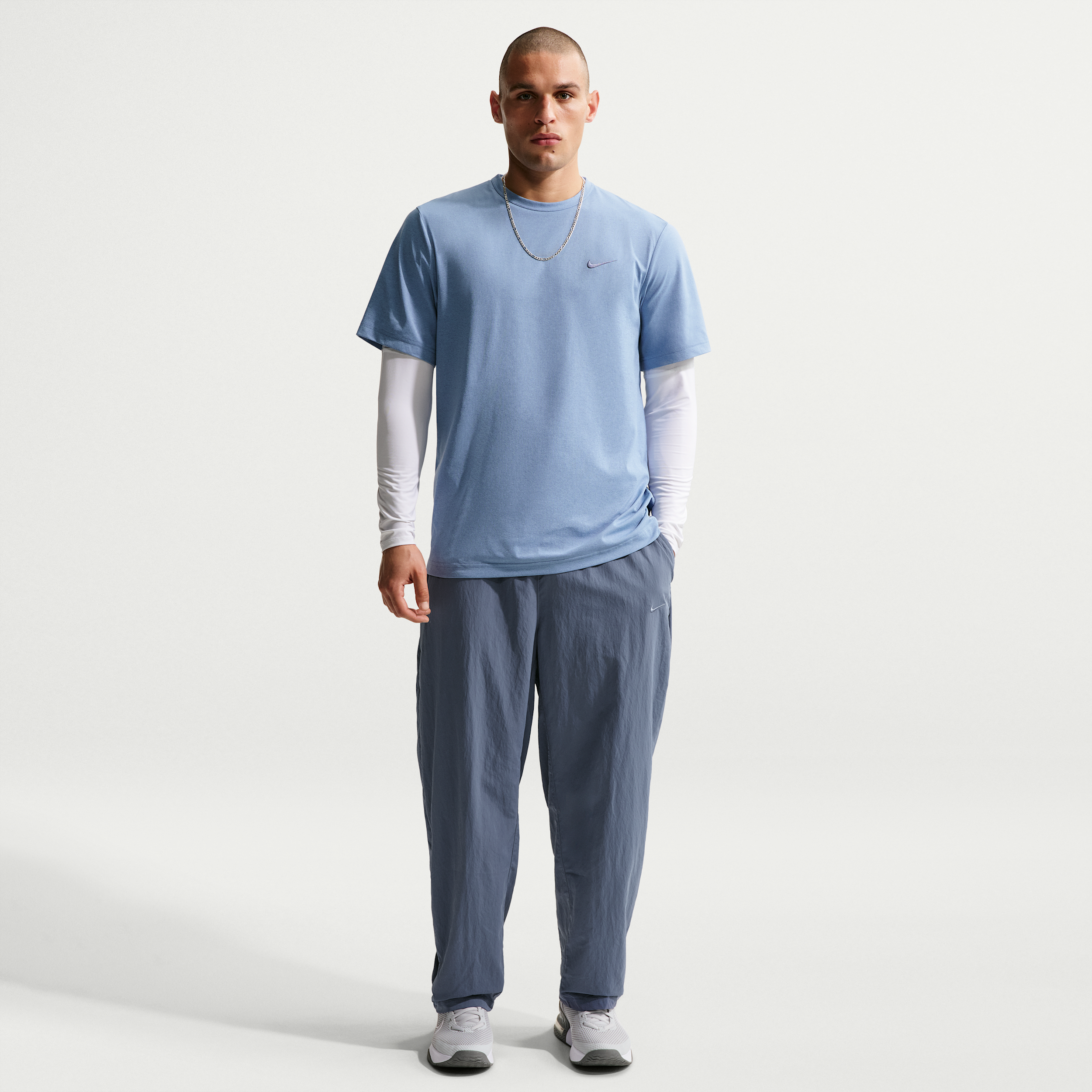 Pantaloni da training in tessuto Dri-FIT NAC Nike – Uomo - Blu