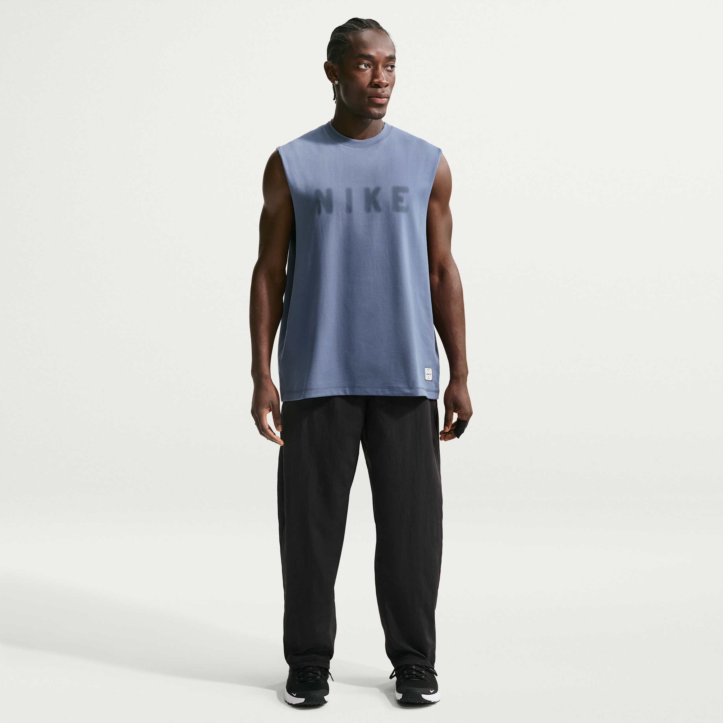 Pantaloni da training in tessuto Nike N.A.C. Dri-FIT – Uomo - Nero