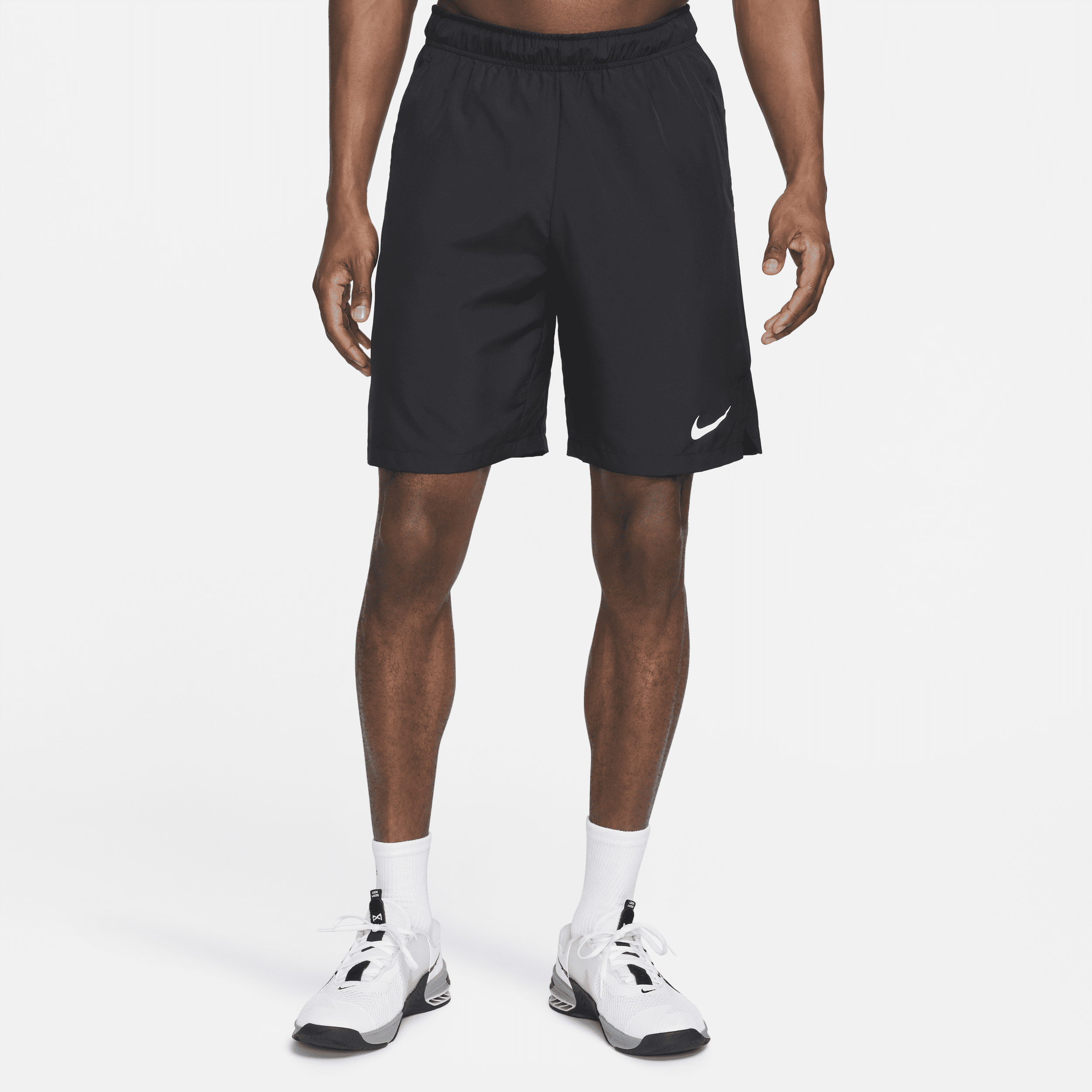 Image of Nike Dri-FIT Geweven trainingsshorts voor heren (23 cm) - Zwart