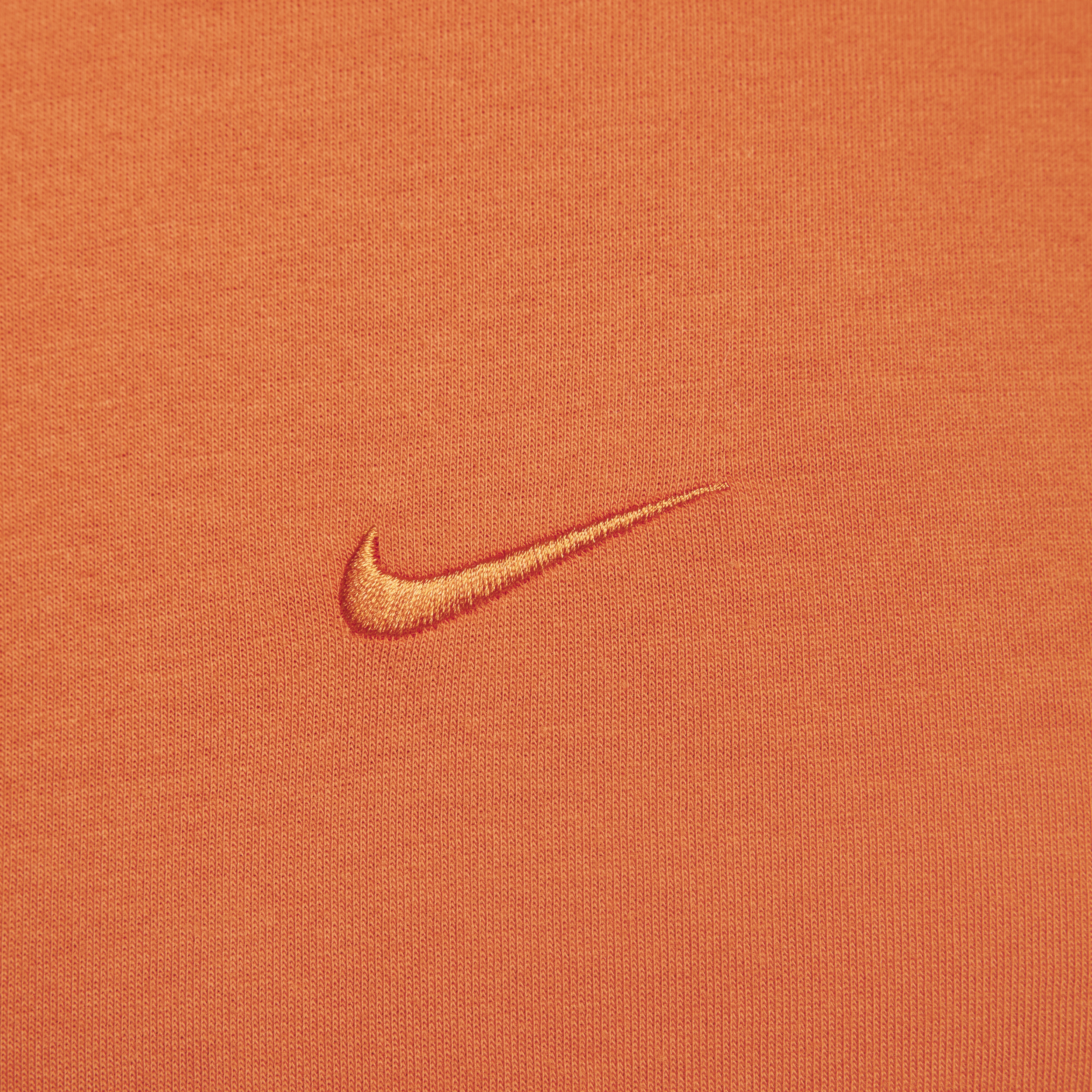 Nike Primary Dri-FIT multifunctionele herentop met korte mouwen Oranje