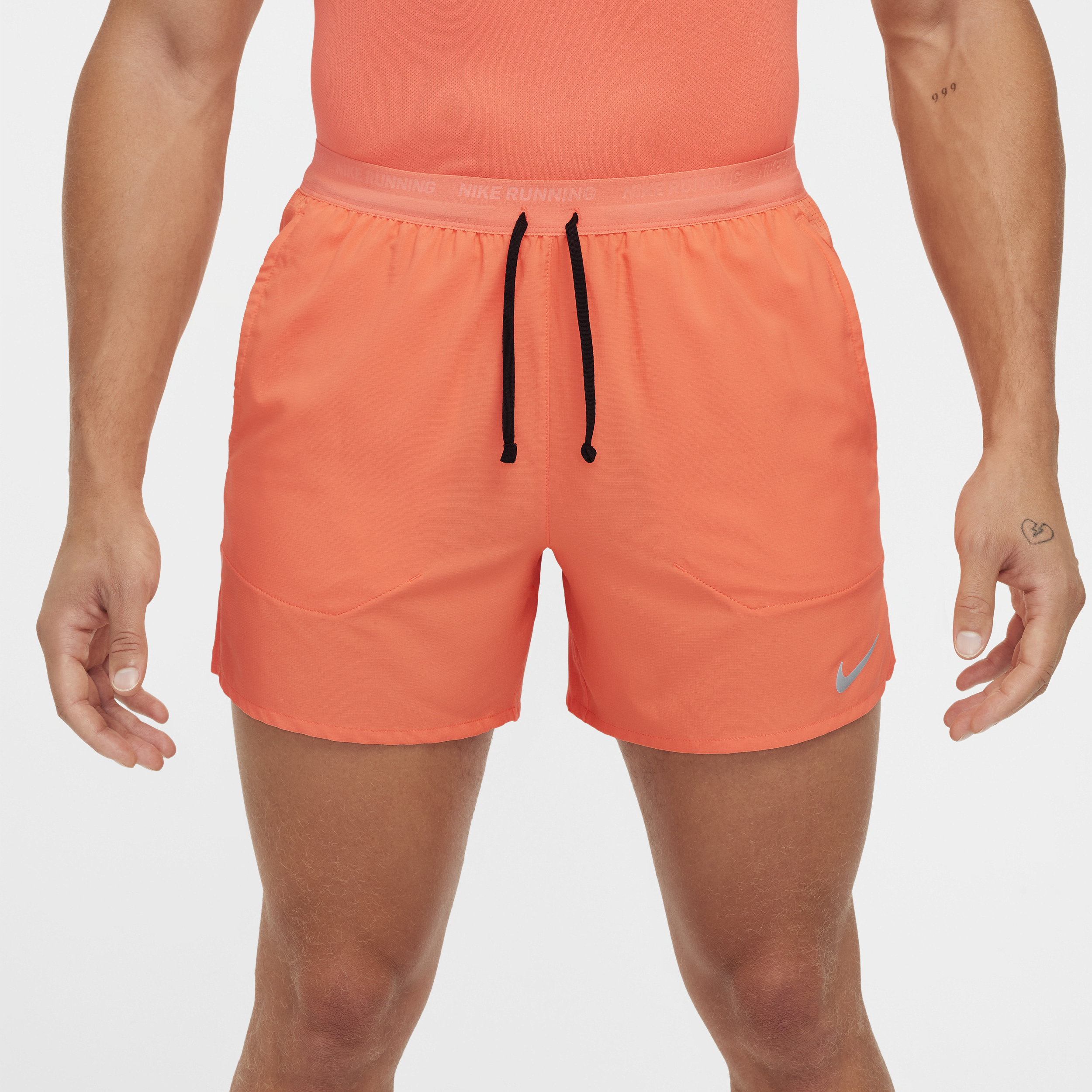 Short de running avec sous-short intégré Dri-FIT Nike Stride 13 cm pour homme - Rose