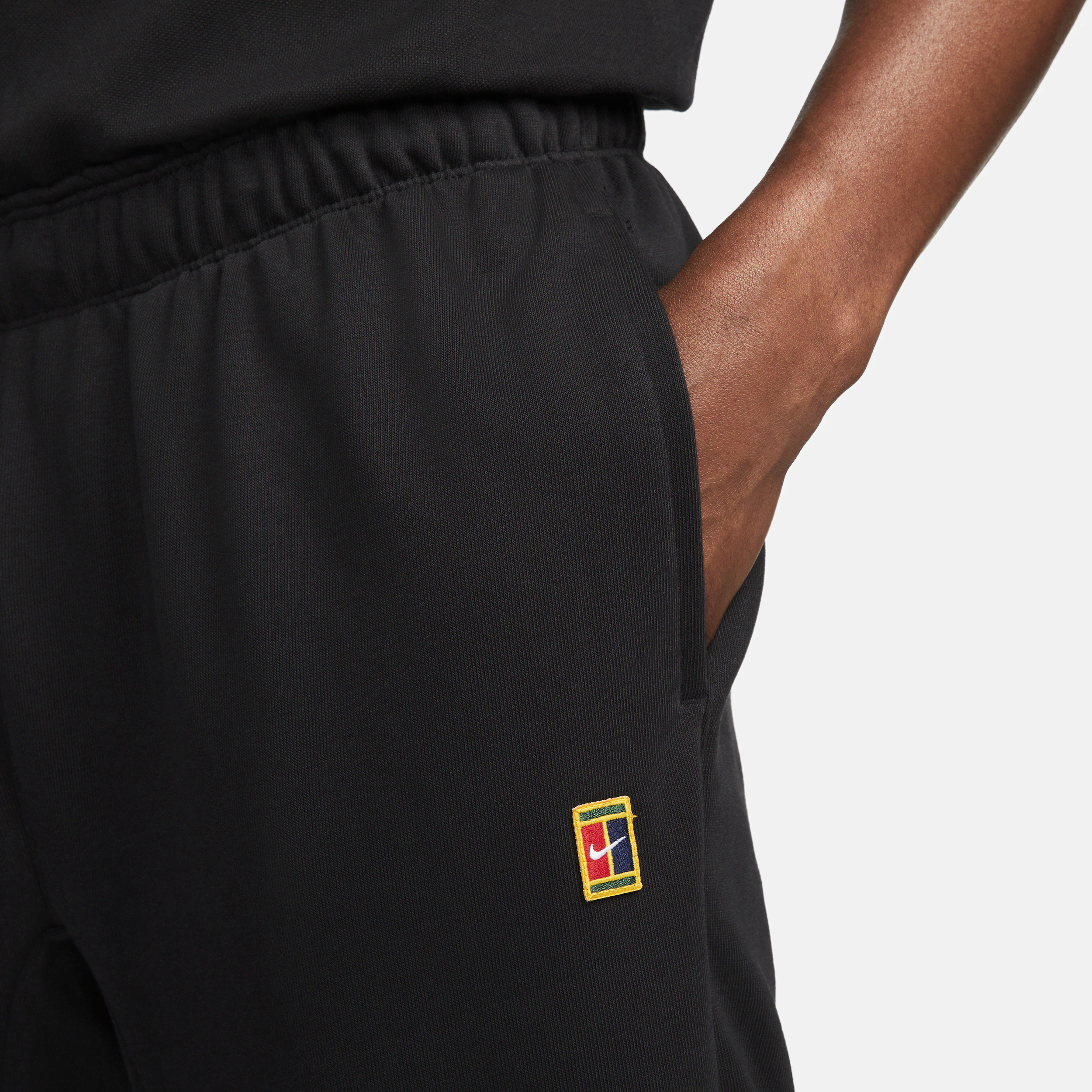 Pantalon de tennis en molleton NikeCourt Heritage pour homme - Noir