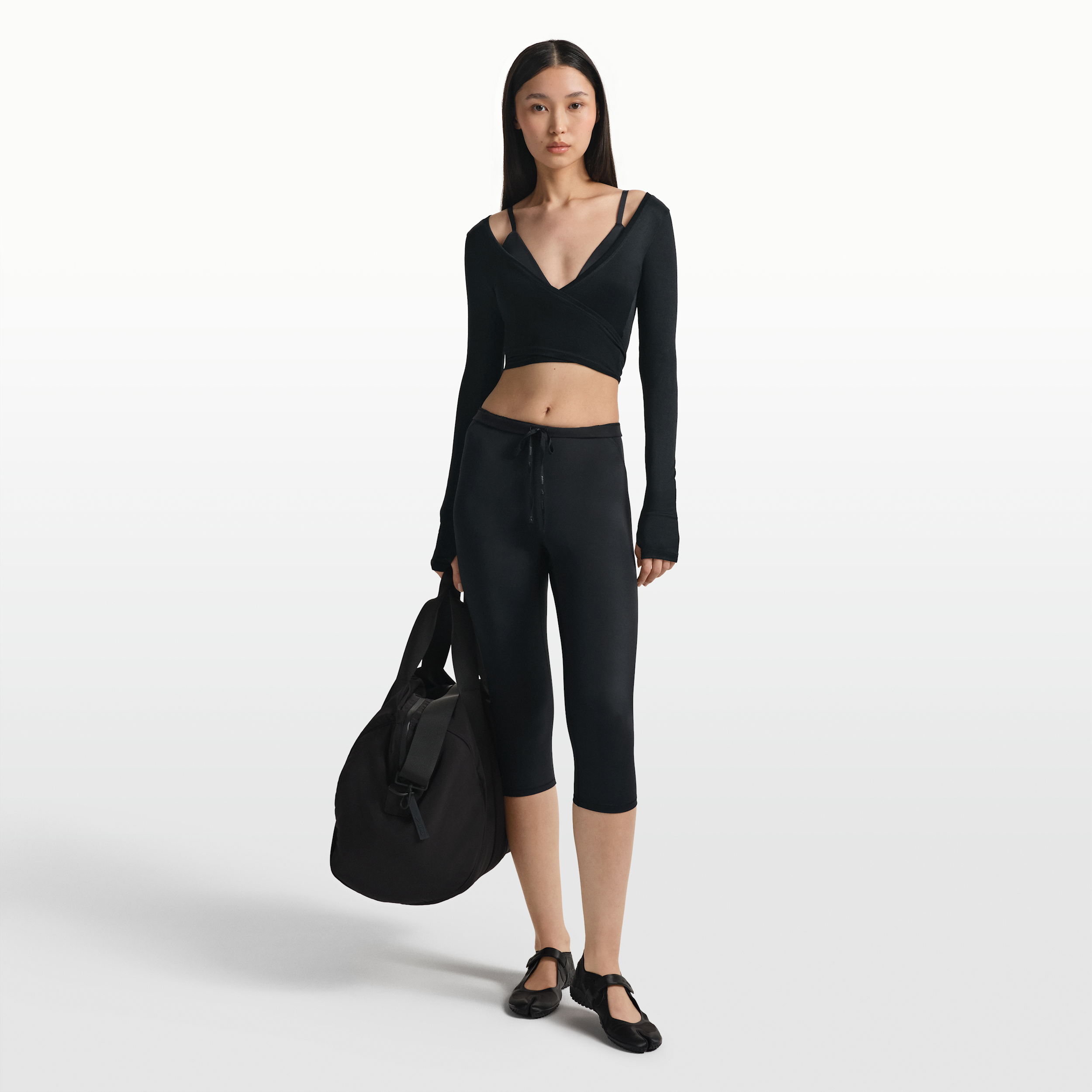 Leggings NikeSKIMS Shine a vita alta 43 cm con coulisse – Donna - Nero