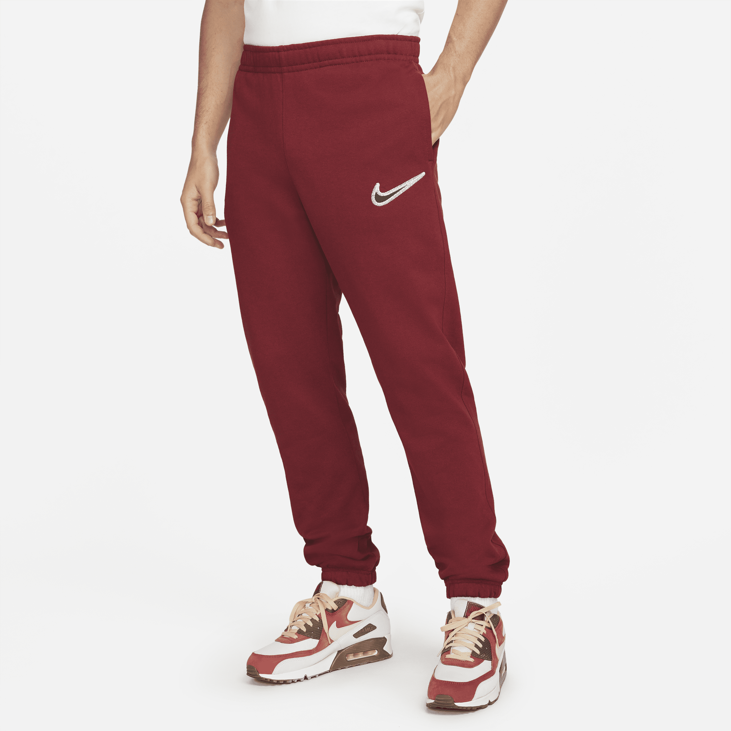 Męskie spodnie z dzianiny Nike Sportswear Swoosh - Czerwony