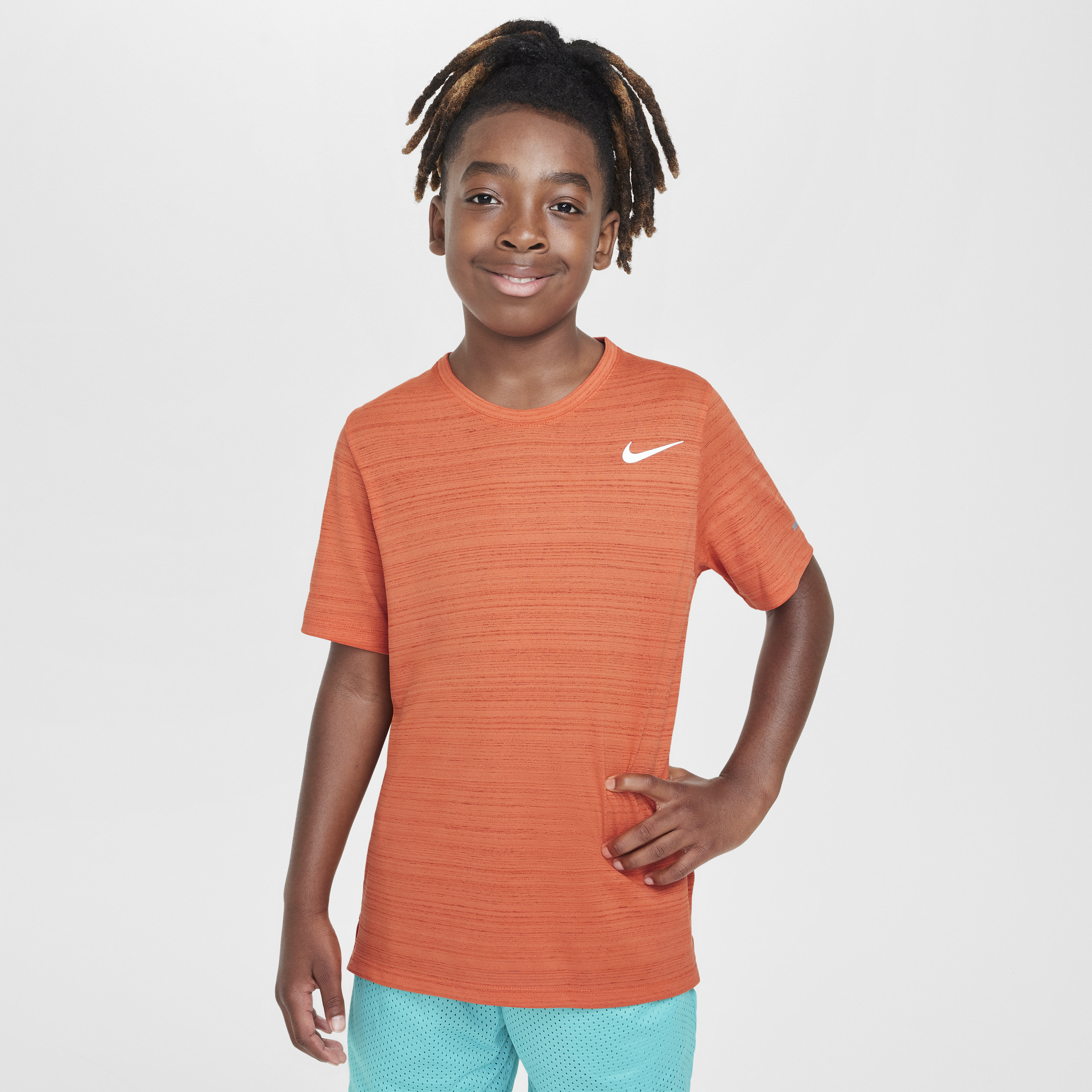 Image of Nike Dri-FIT Miler trainingstop voor jongens - Oranje