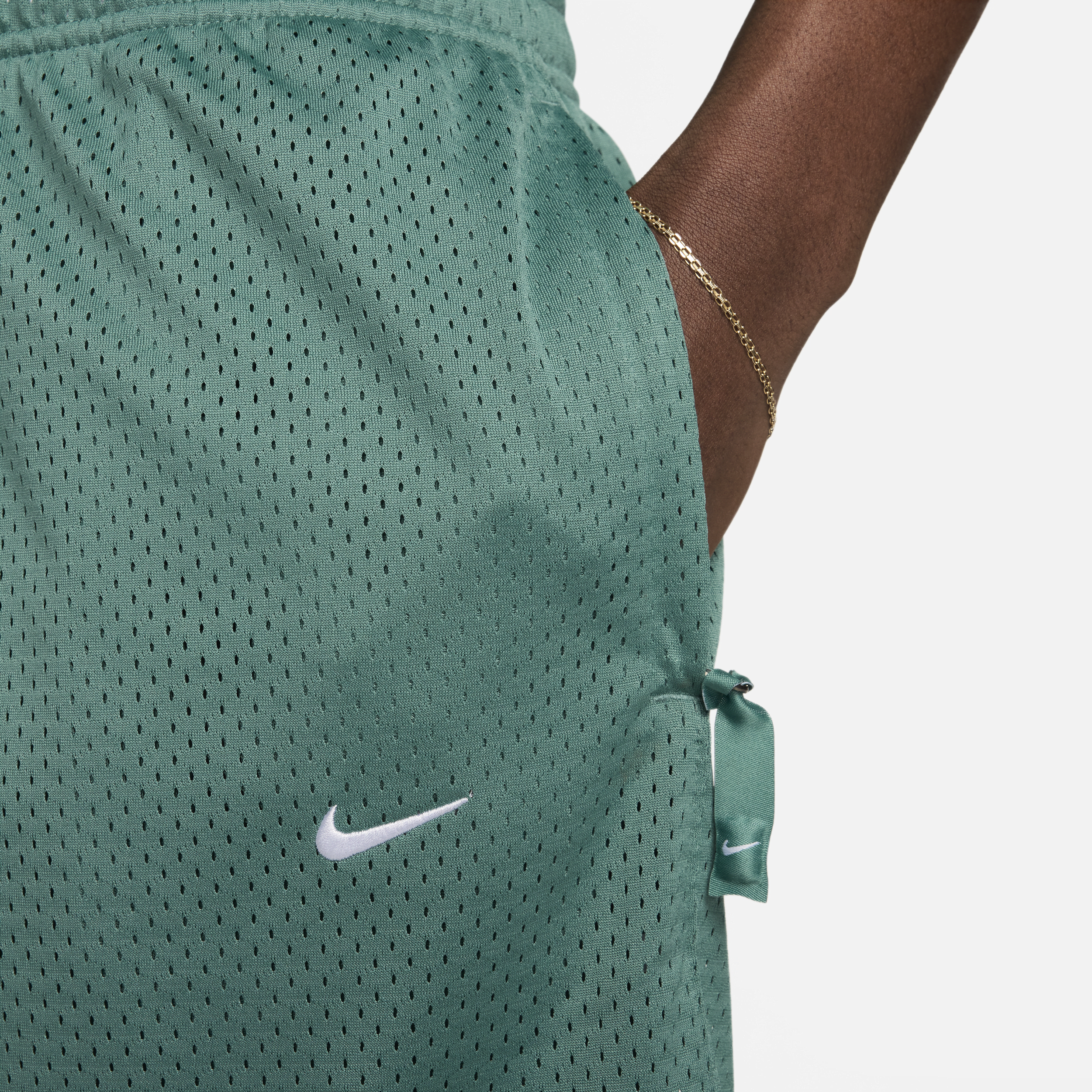 Nike Sportswear Swoosh herenshorts met mesh Groen