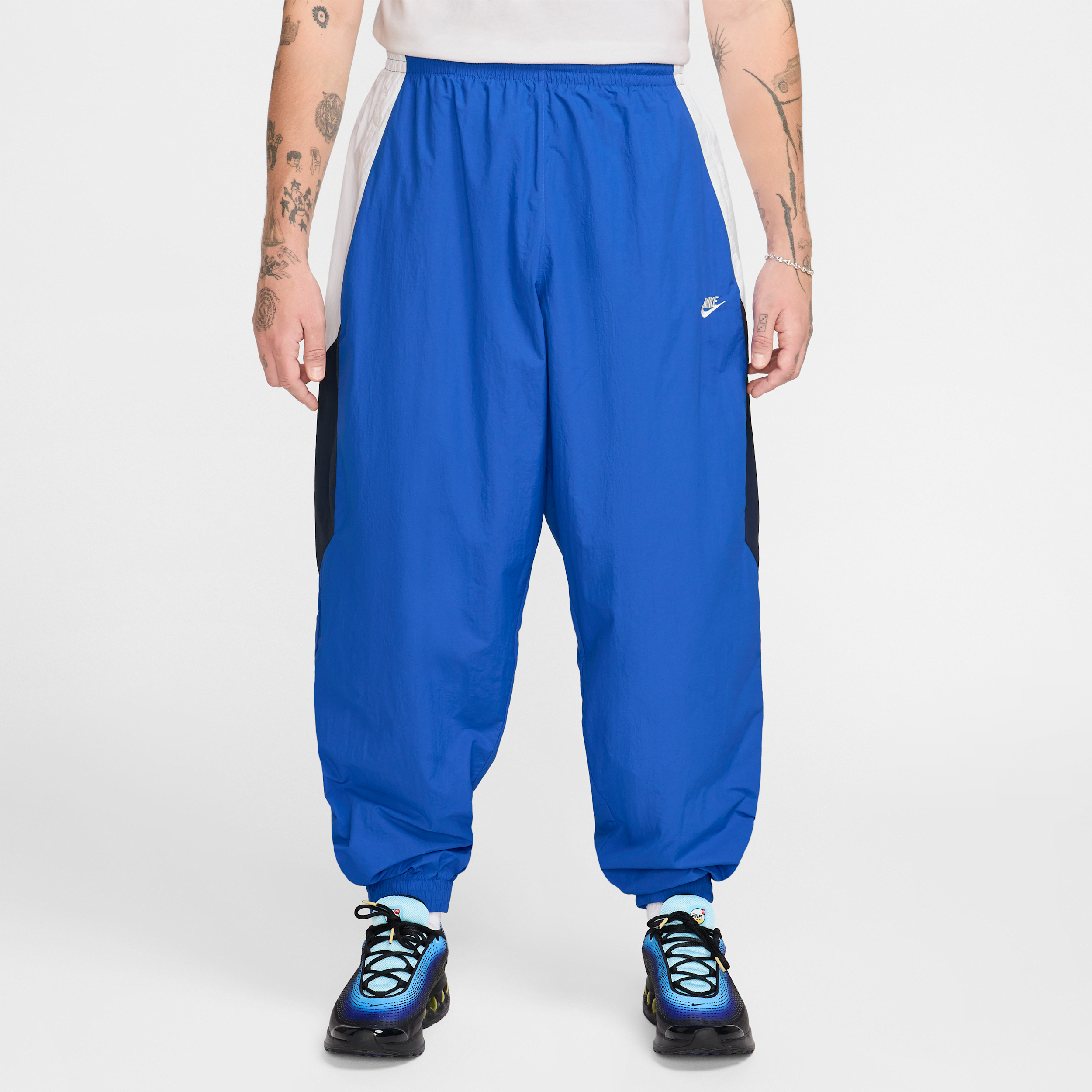 Nike Club Men's Oversized Woven Tracksuit Bottoms - Blue