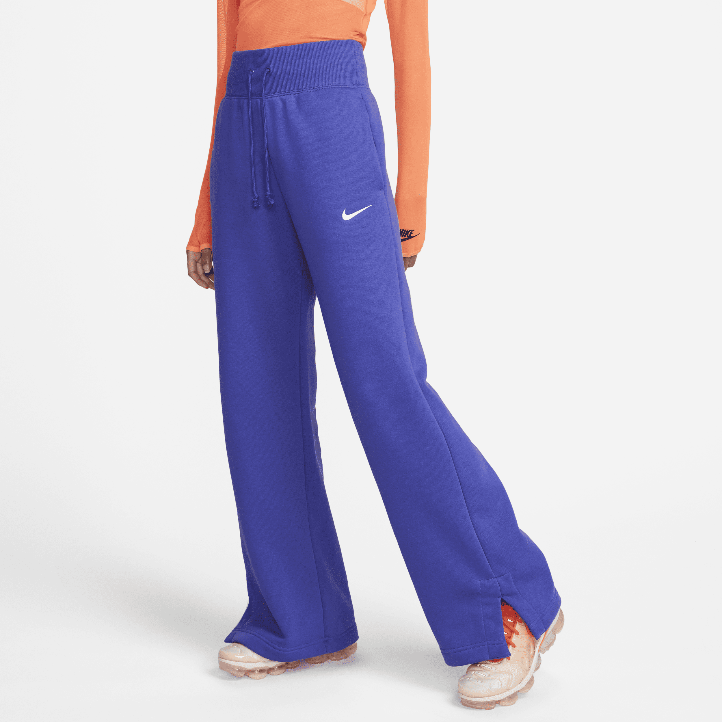 Damskie spodnie dresowe z wysokim stanem i szerokimi nogawkami Nike Sportswear Phoenix Fleece - Niebieski
