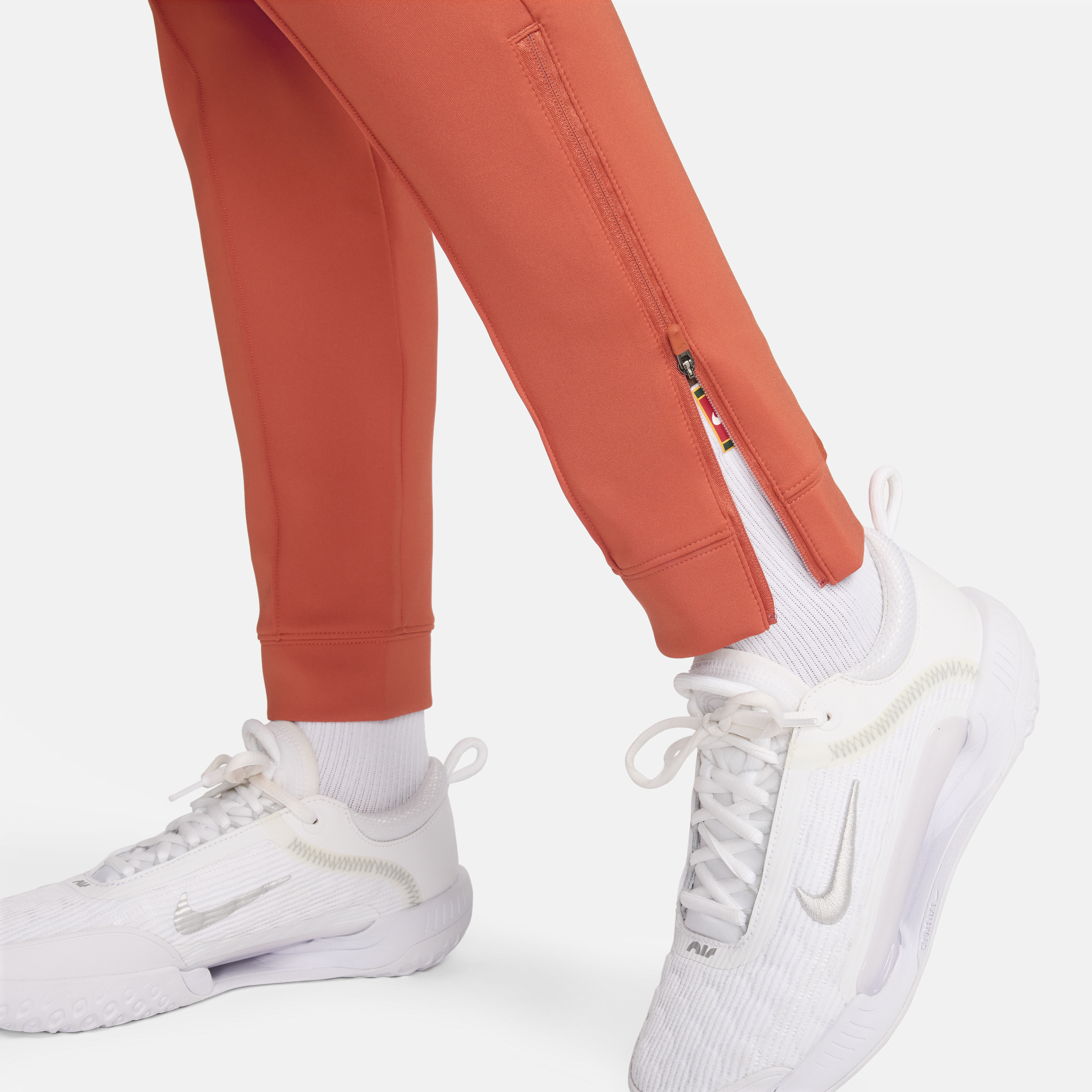 Nike Court Dri-FIT Knit tennisbroek voor dames Oranje
