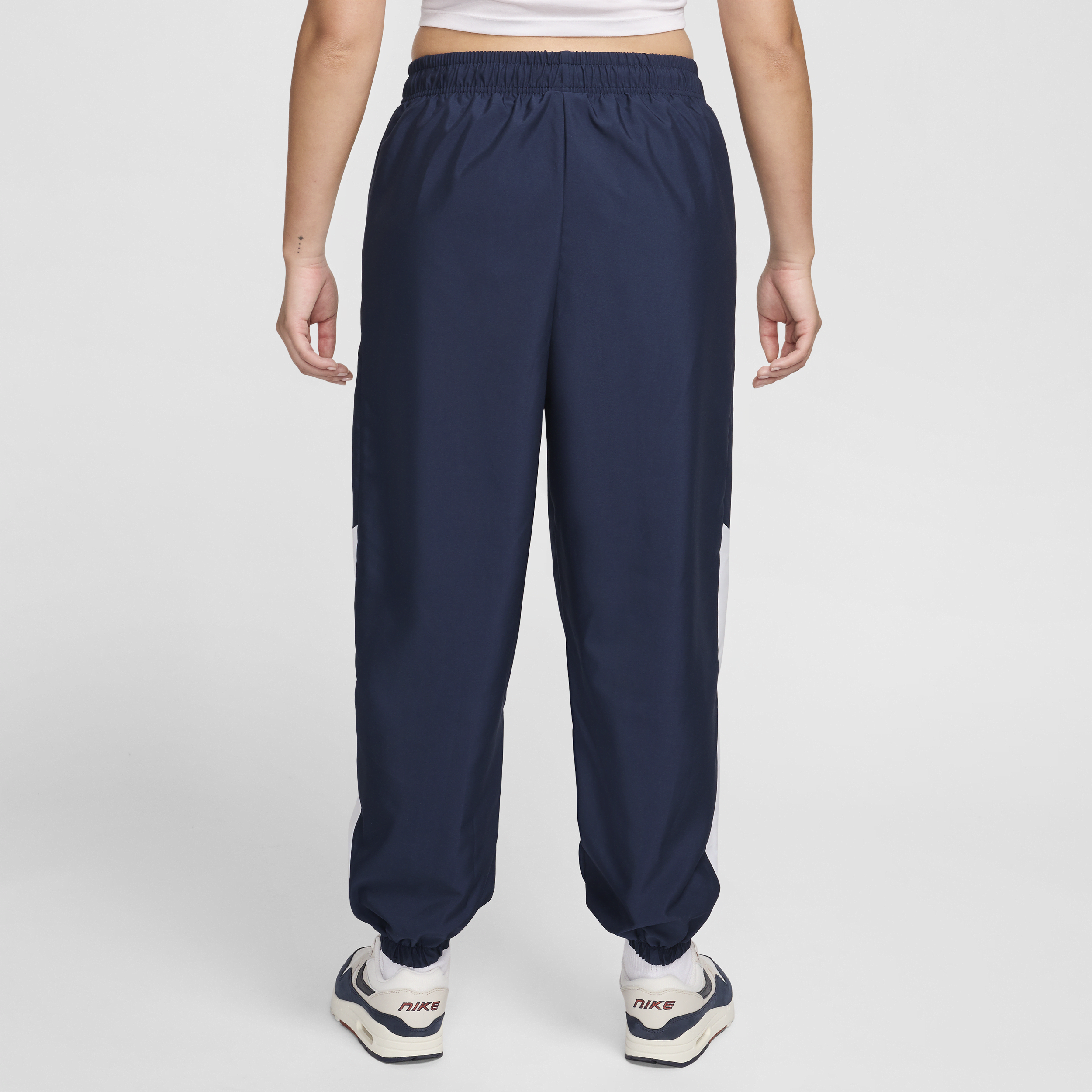 Nike Sportswear geweven joggingbroek voor dames Blauw