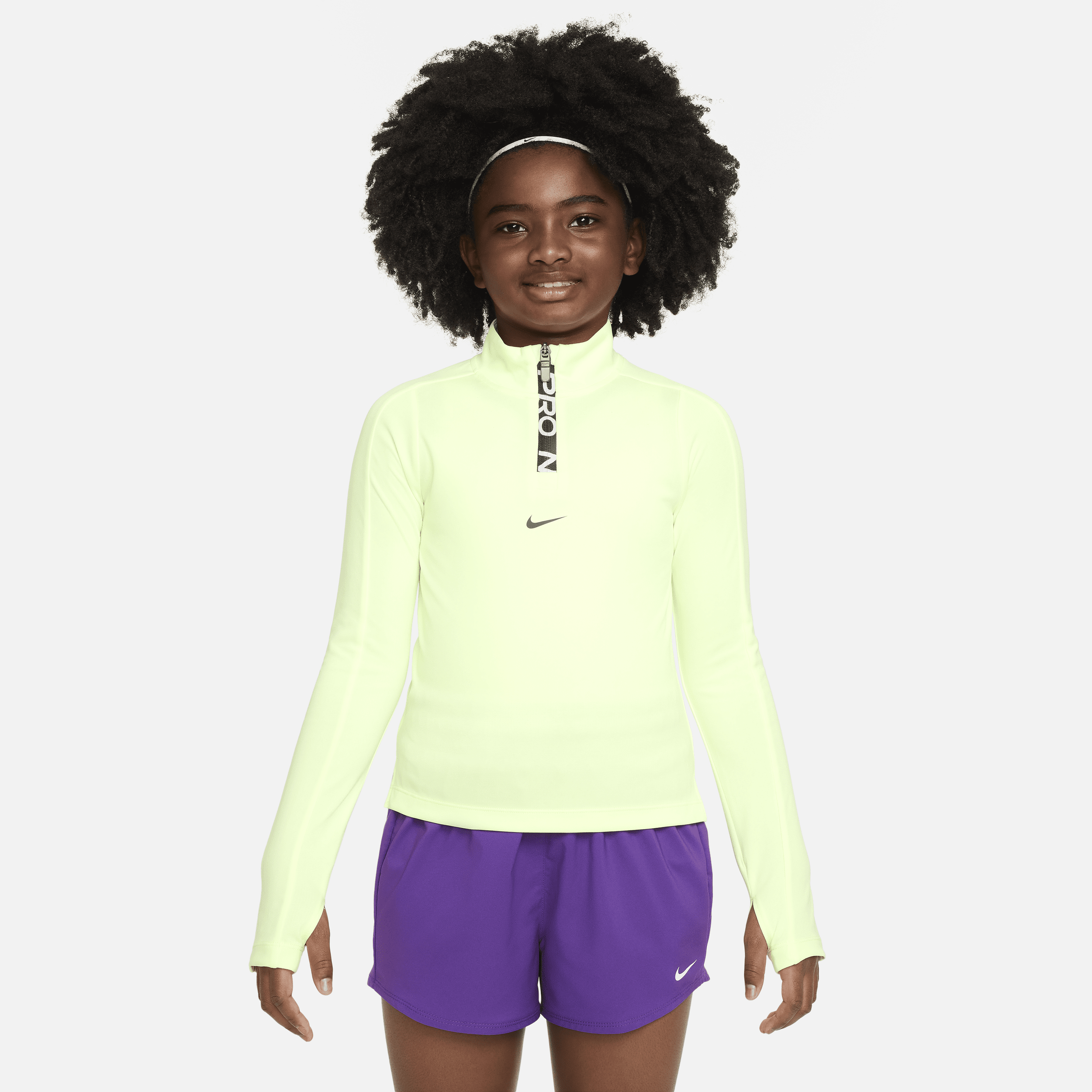 Nike Pro Dri-FIT meisjestop met lange mouwen en halflange rits Geel