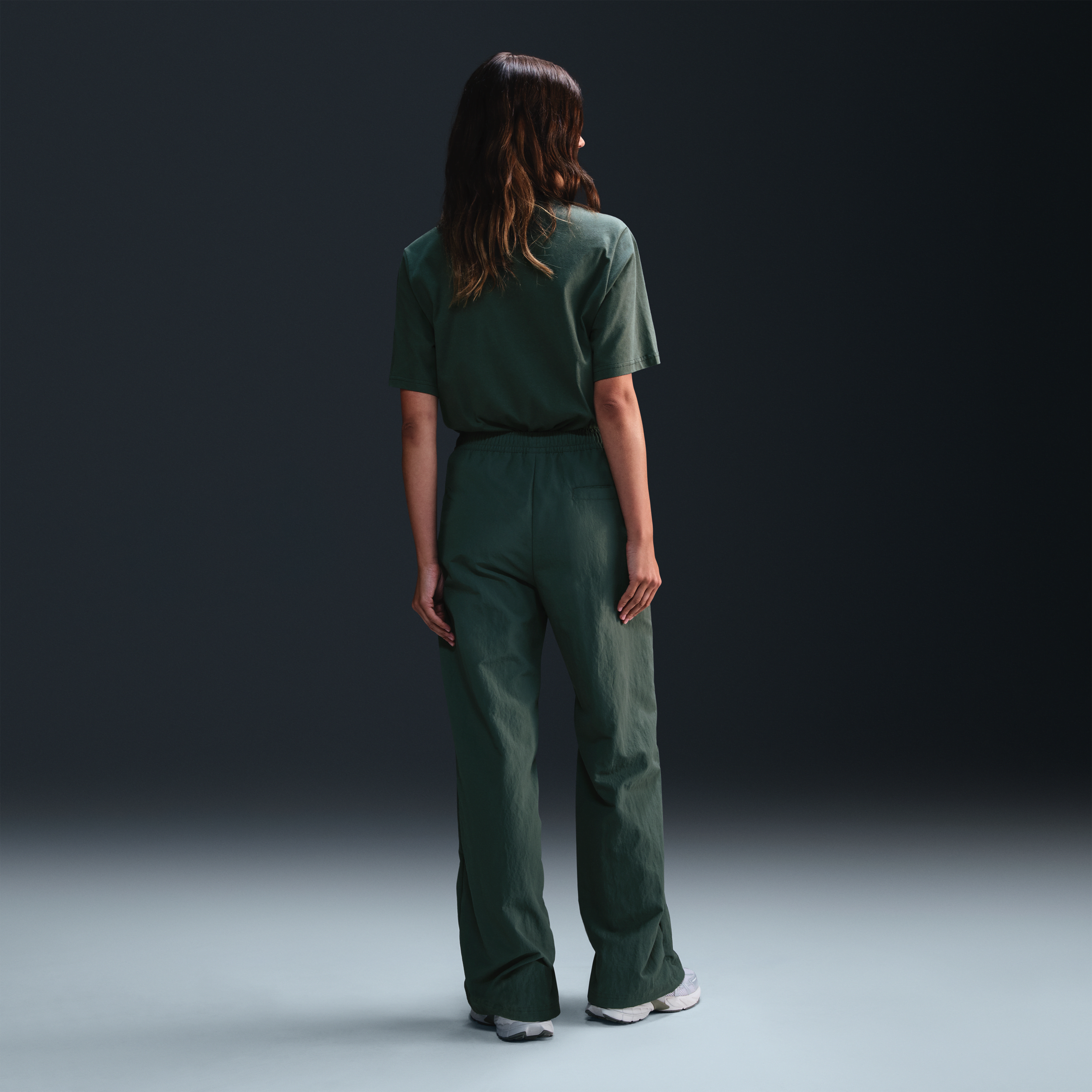 Pantalon taille mi-haute à ourlet ouvert Nike Sportswear Everything Wovens pour femme - Vert