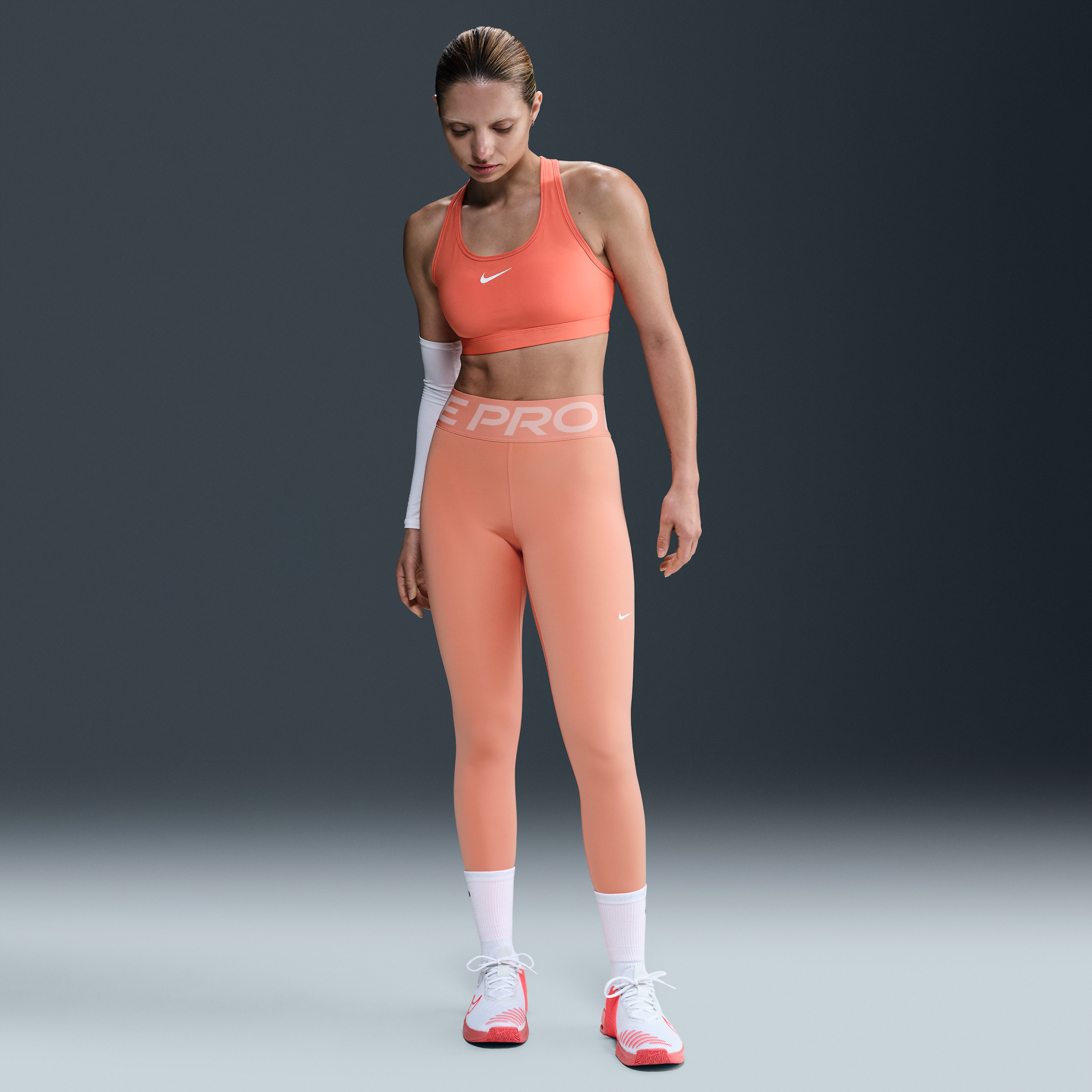 legging-long-taille-haute-nike-pro-sculpt-pour-femme-orange-nike-store-41083232850