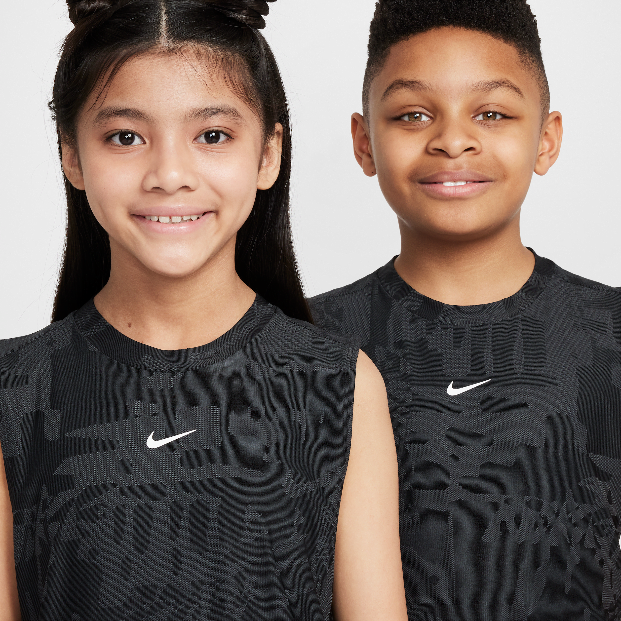 Thumbnail - Nike Multi ärmelloses Dri-FIT-Shirt (ältere Kinder) - Schwarz