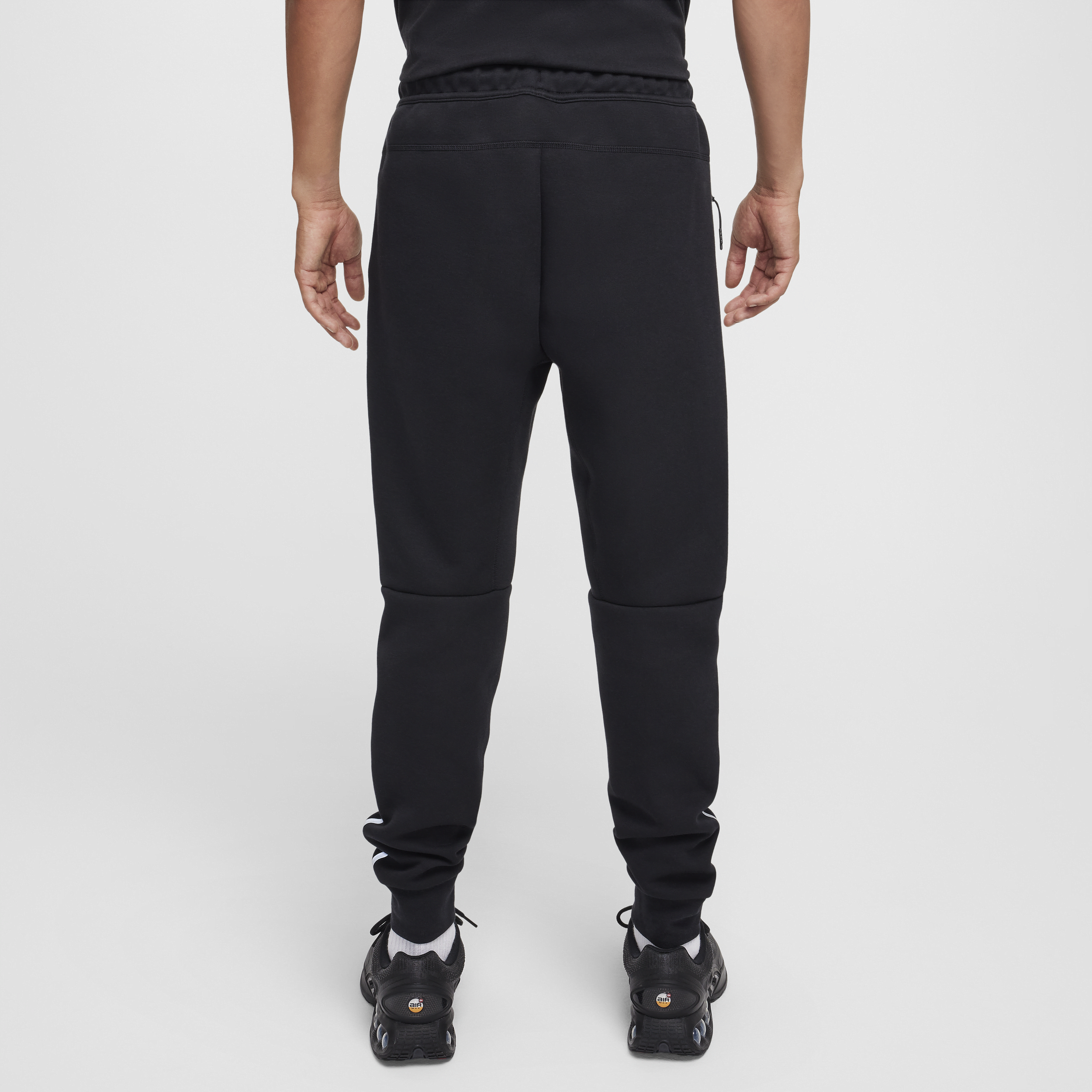 Pantalon de jogging en tissu Fleece à motifs réfléchissants Nike Tech pour homme - Noir