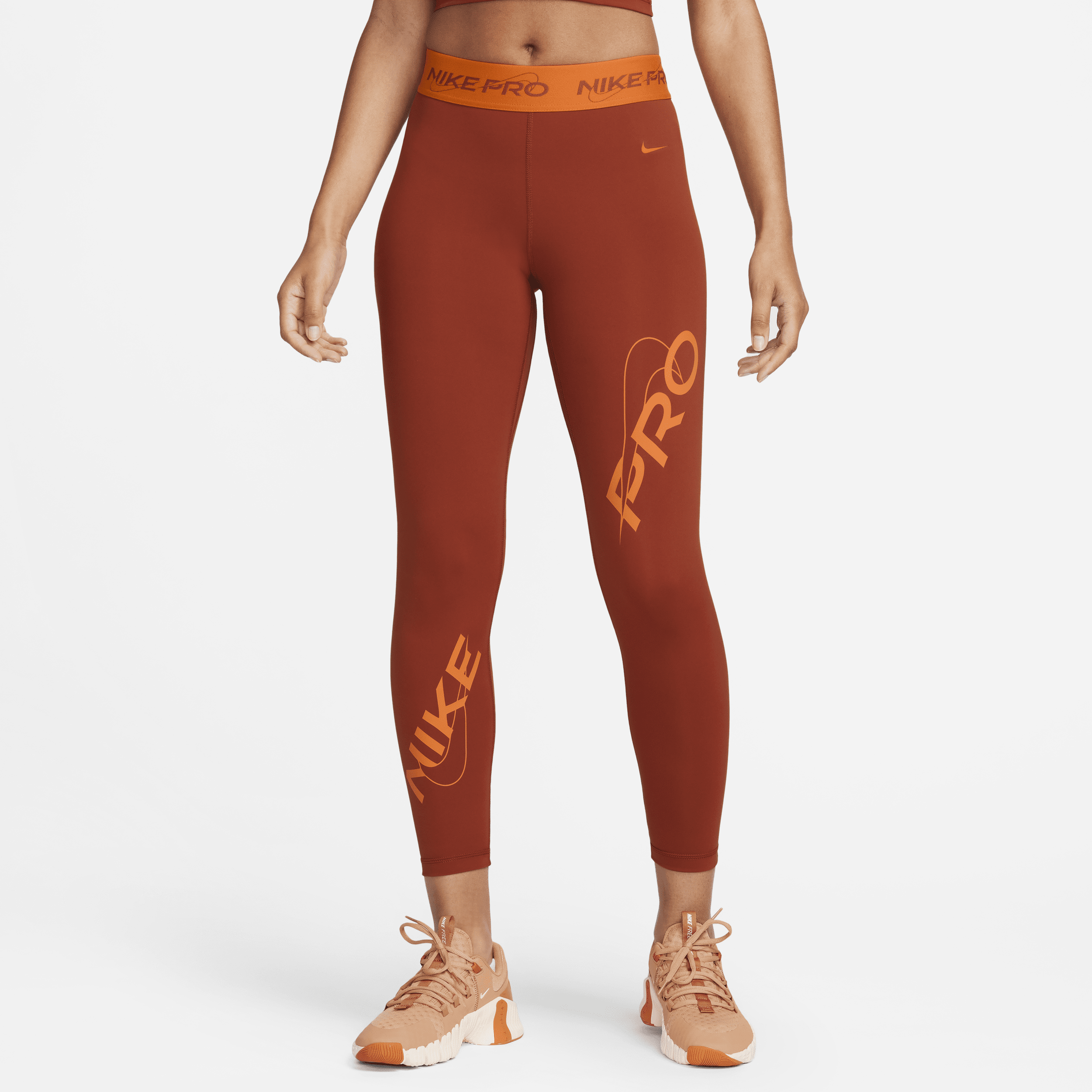 Nike Pro 7 8-legging met halfhoge taille en graphic voor dames Oranje