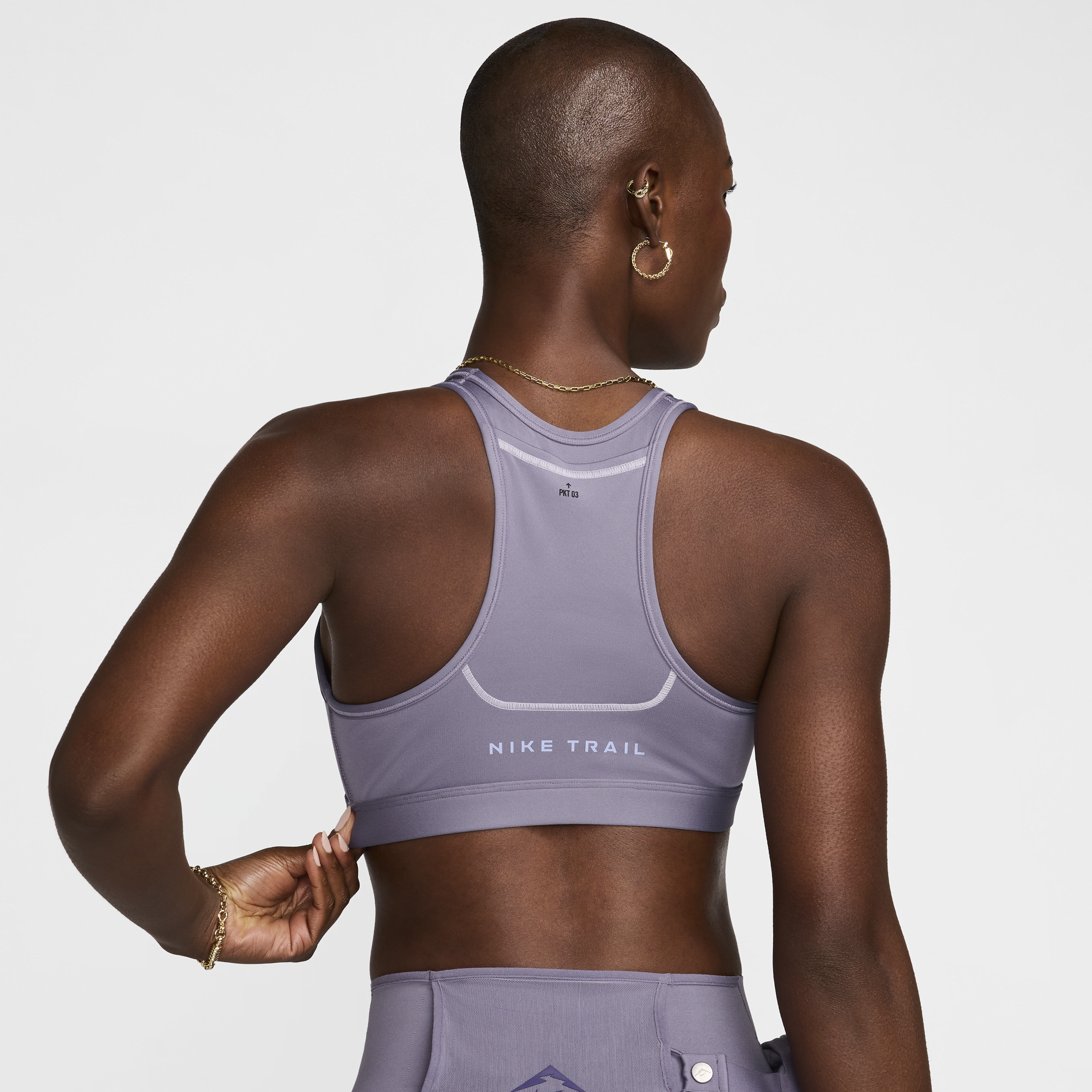 Nike Trail Swoosh On-The-Run licht gevoerde sport-bh met medium ondersteuning Paars
