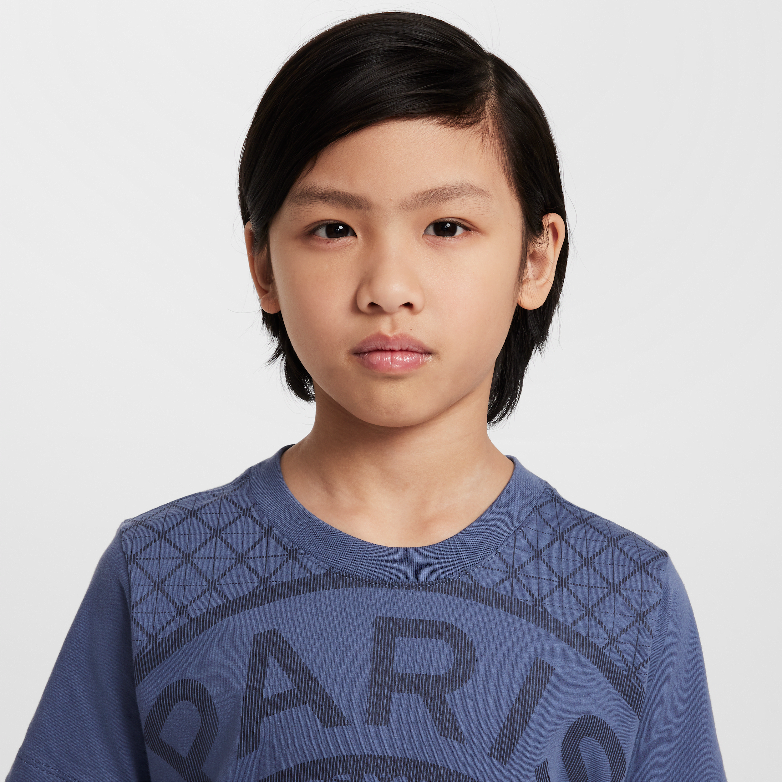 Thumbnail - Paris Saint-Germain Nike Fußball-T-Shirt mit saisonalem Print (ältere Kinder) - Blau