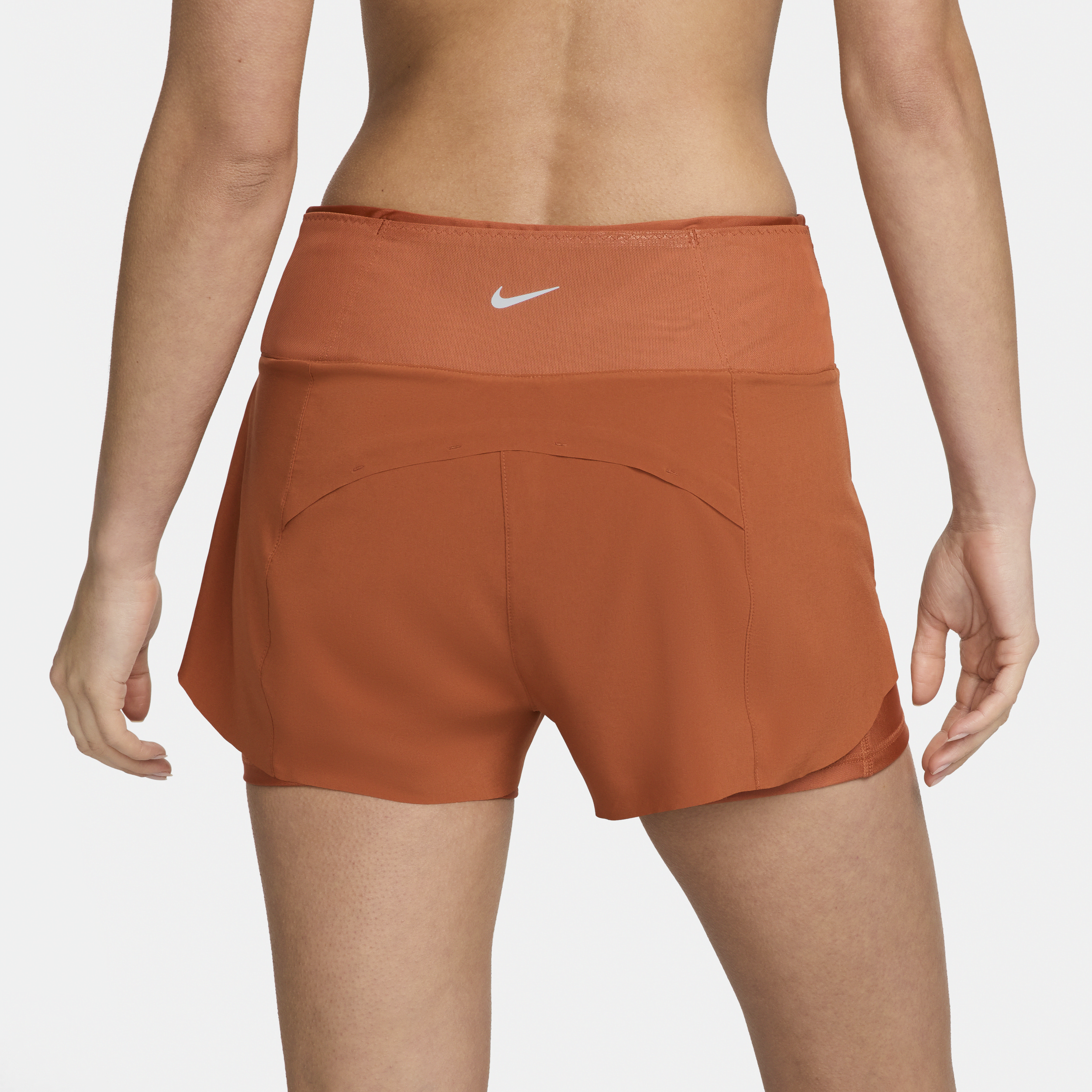 Nike Dri-FIT Swift 2-in-1 hardloopshorts met halfhoge taille en zakken voor dames (8 cm) Oranje