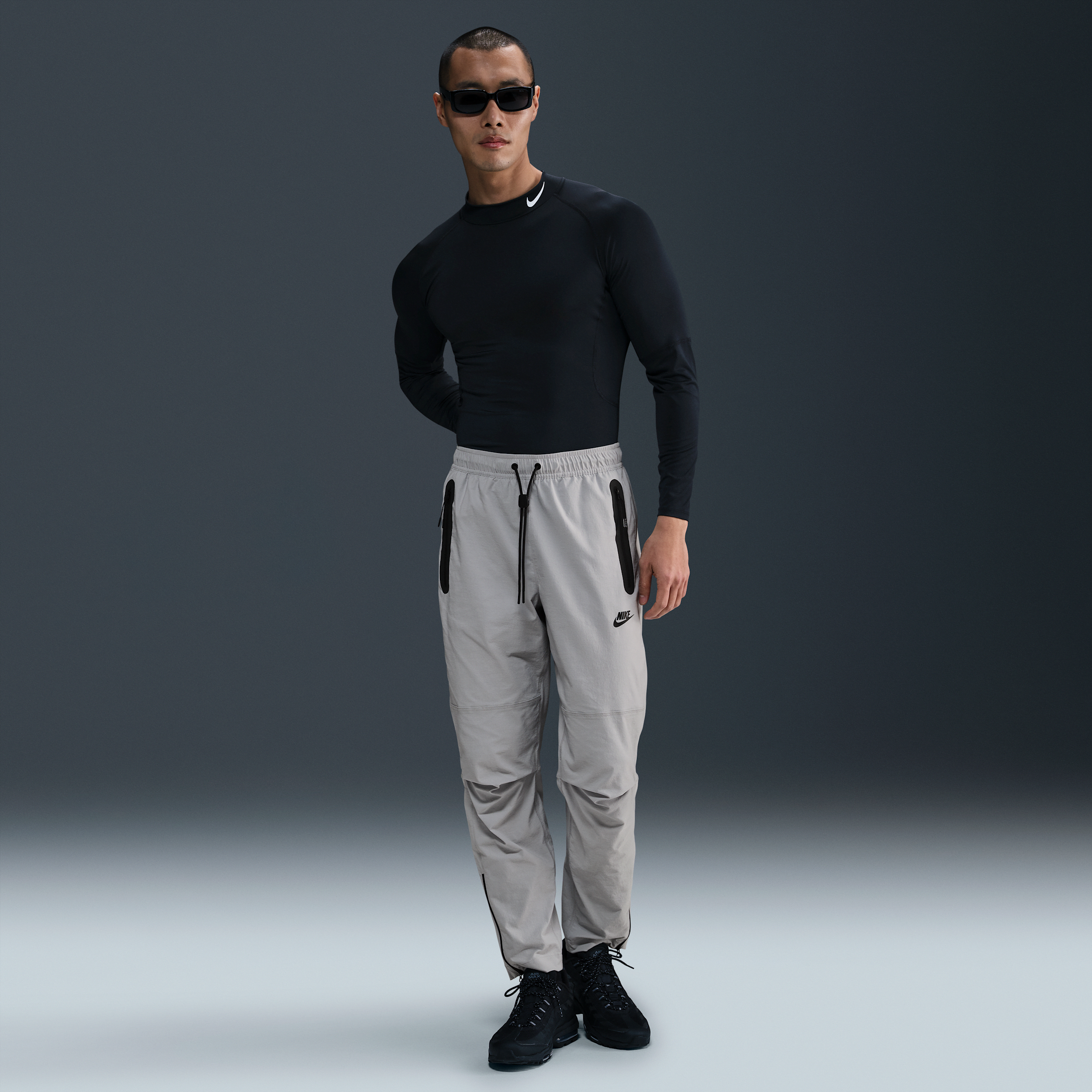 Thumbnail - Nike Tech Webhose mit offenem Saum (Herren) - Grau