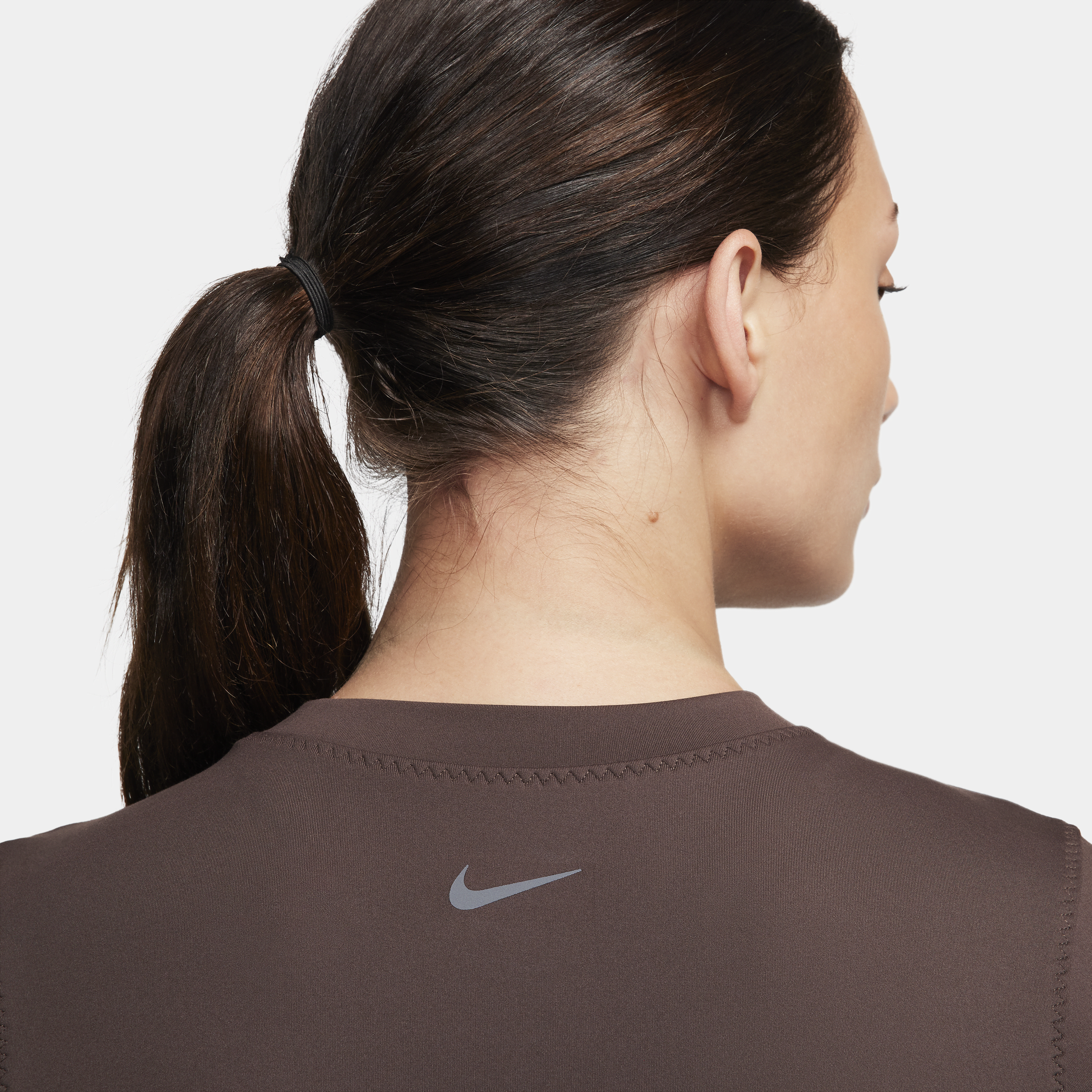 Nike One Fitted Dri-FIT damestop met lange mouwen Bruin