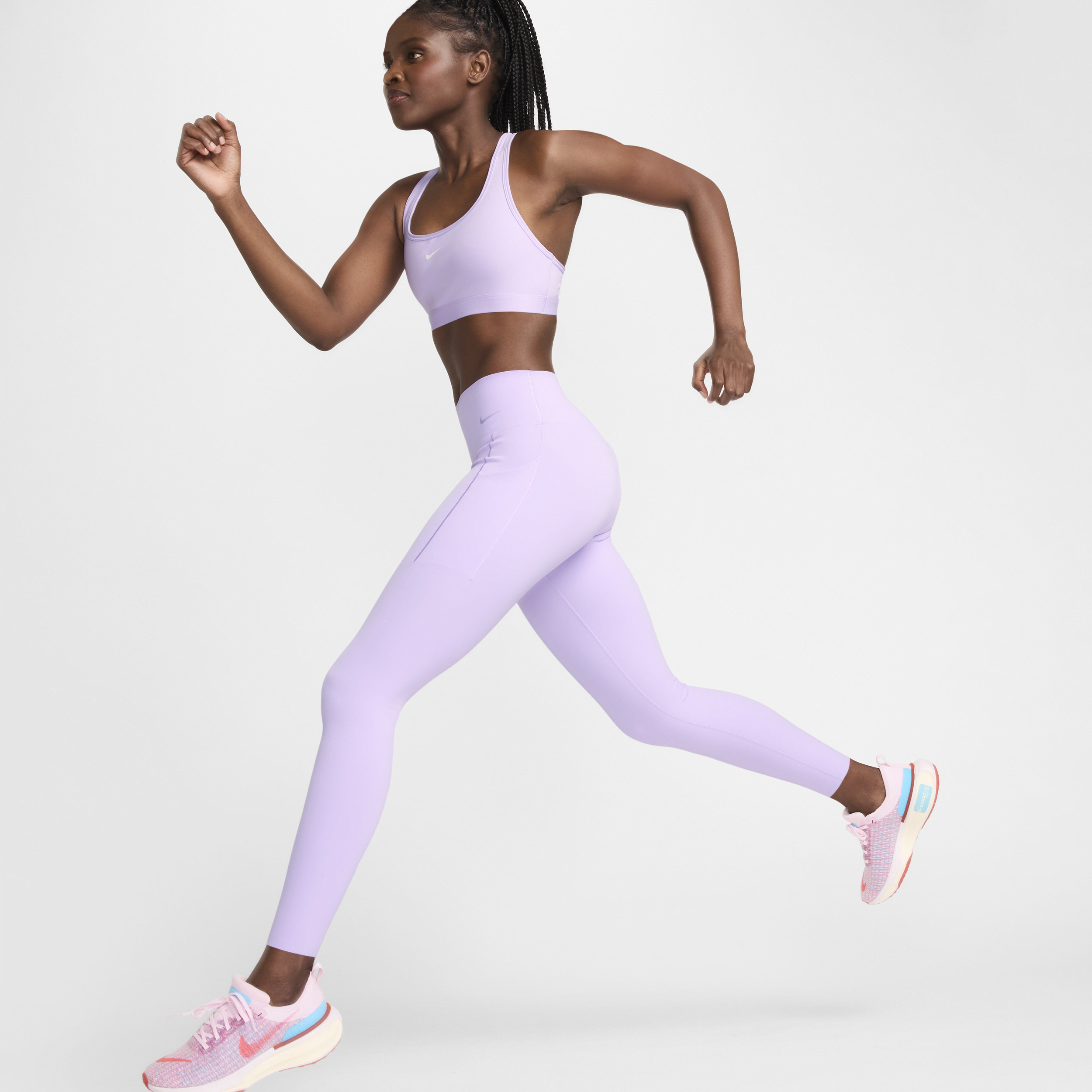 Nike Universa Legging met halfhoge taille en medium ondersteuning en zakken voor dames Paars