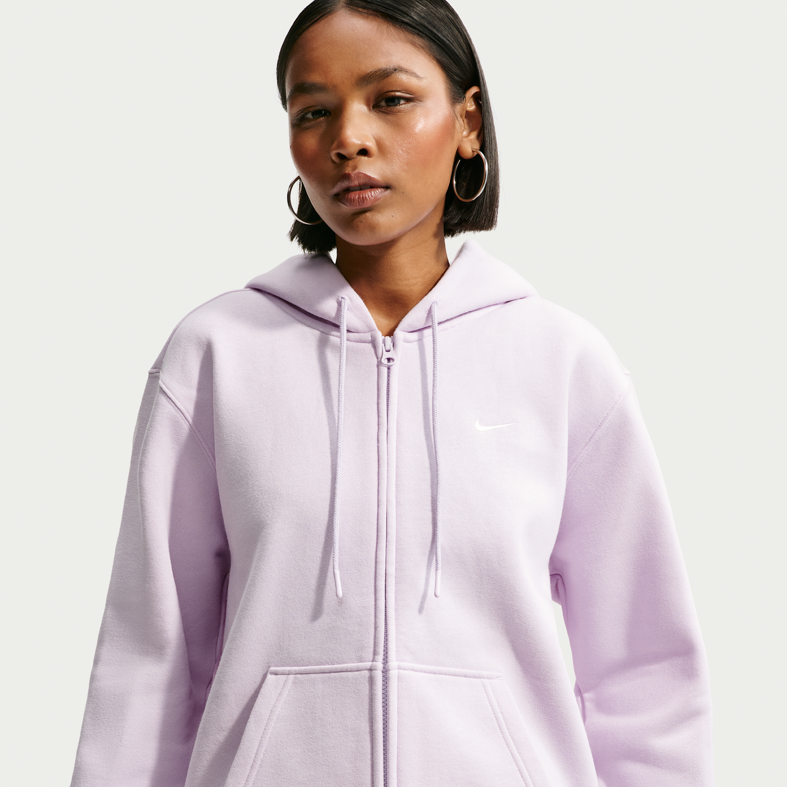 Nike Studio Fleece-hættetrøje i medium vægt med lynlås i fuld længde til kvinder - lilla