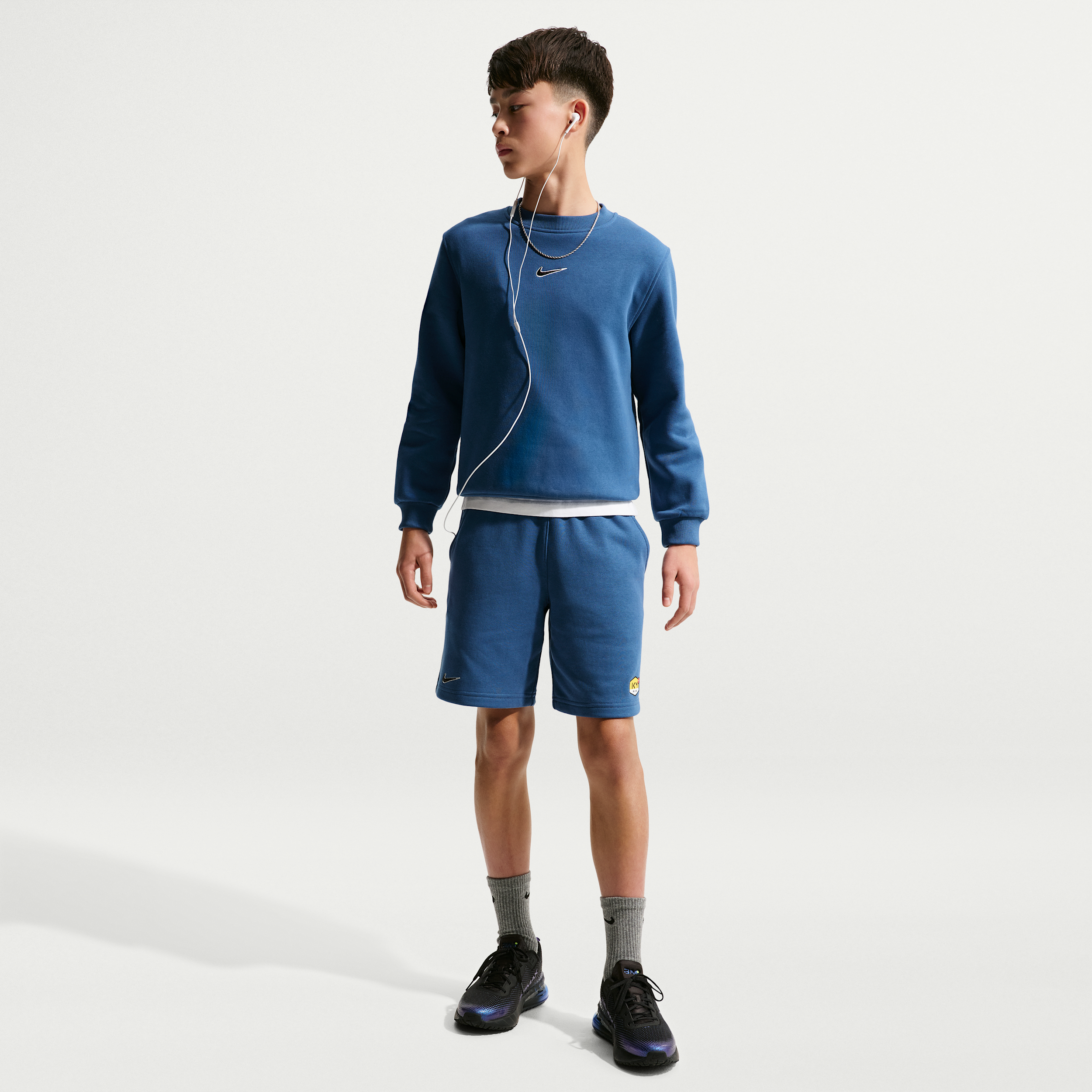 Shorts da calcio Kylian Mbappé in Club Fleece – Ragazzo/a - Blu