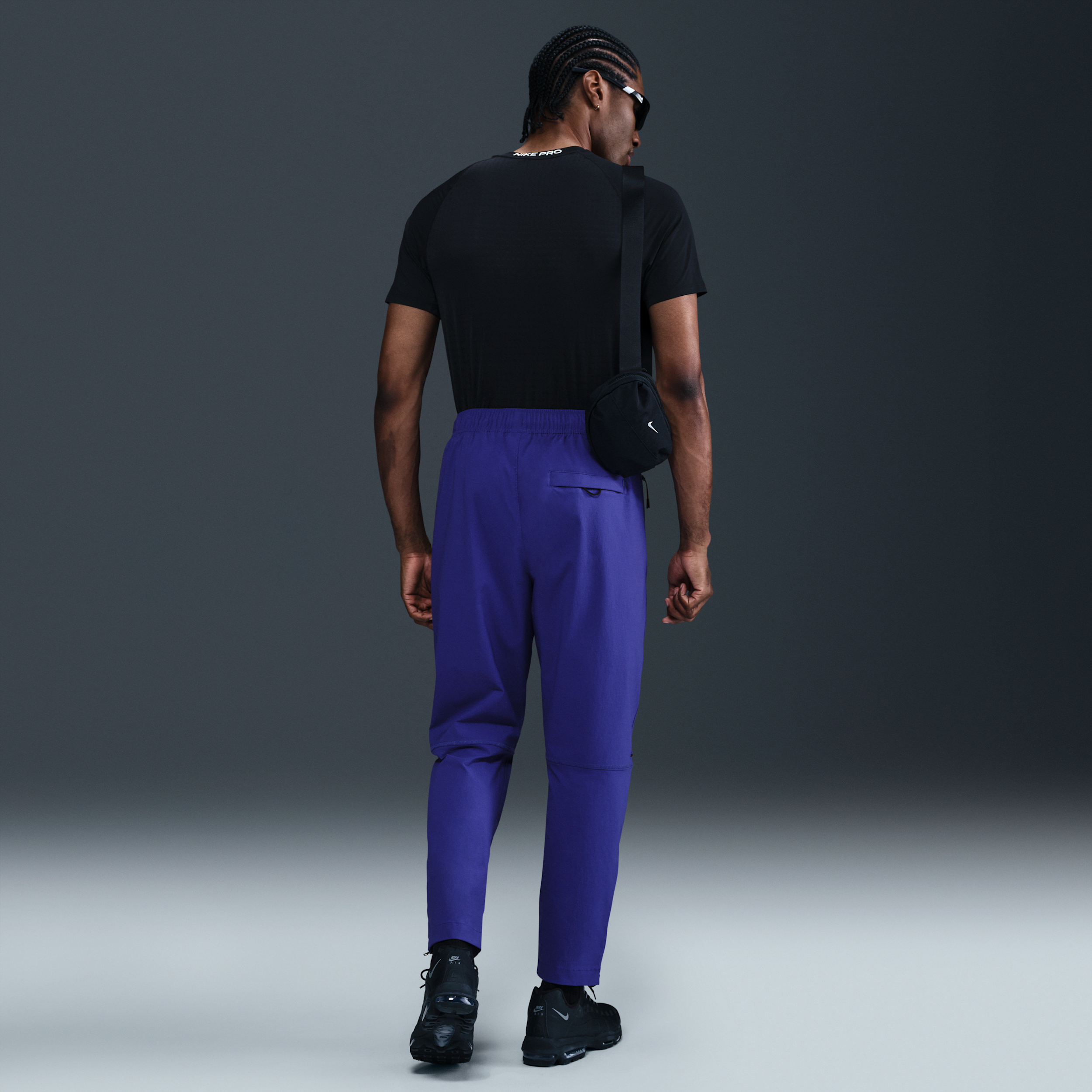 Pantalon tissé Nike Tech pour homme - Pourpre