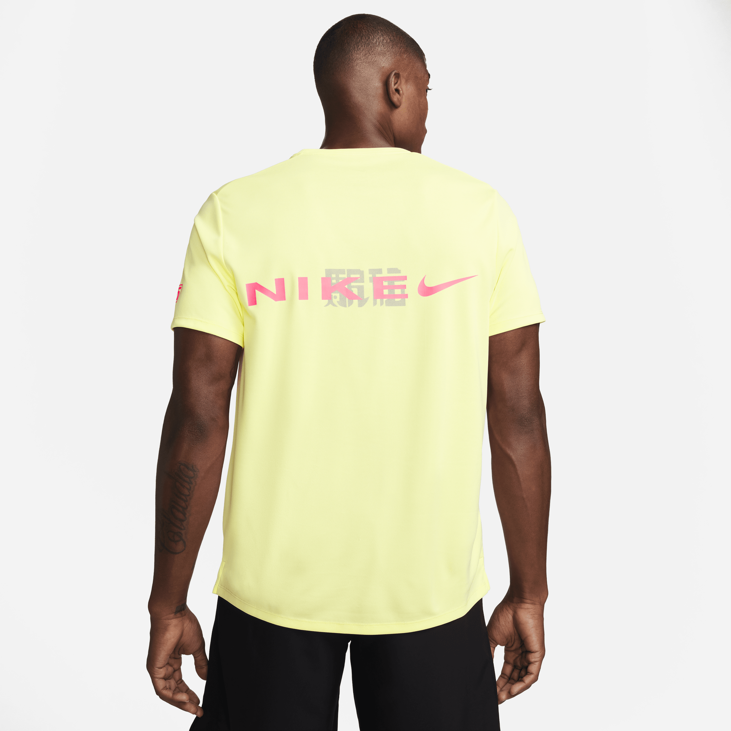 Nike Miler UV hardlooptop met korte mouwen en Dri-FIT voor heren Groen